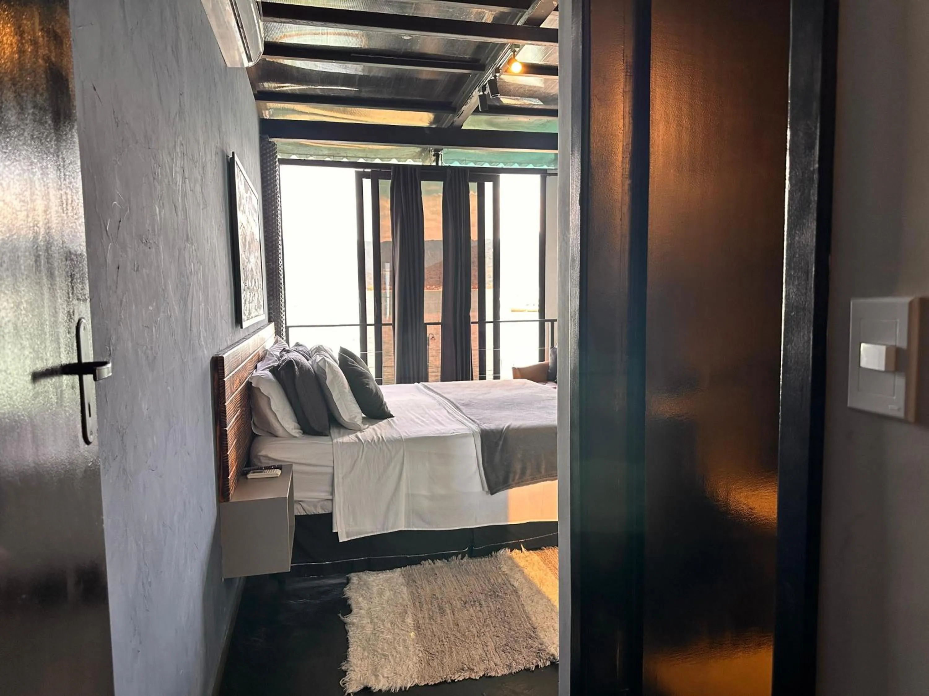 Bed in 1819 Marine Hotel