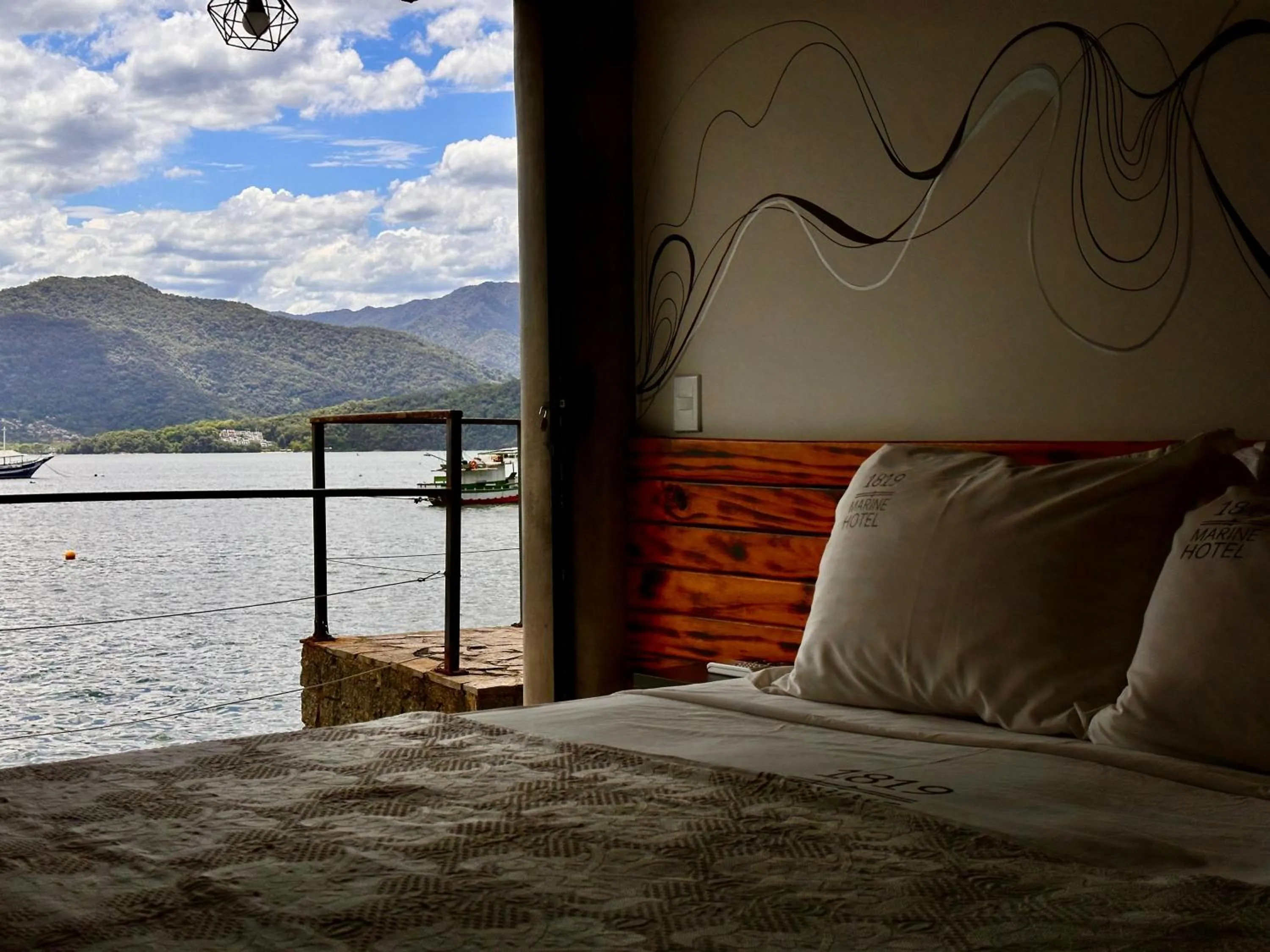 Bed in 1819 Marine Hotel