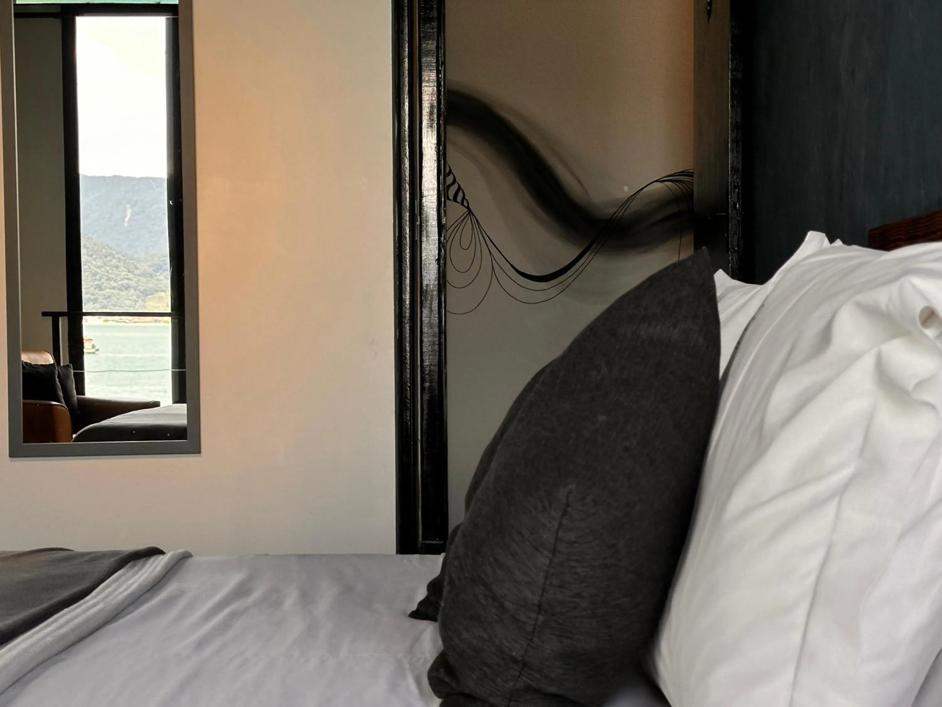 Bed in 1819 Marine Hotel