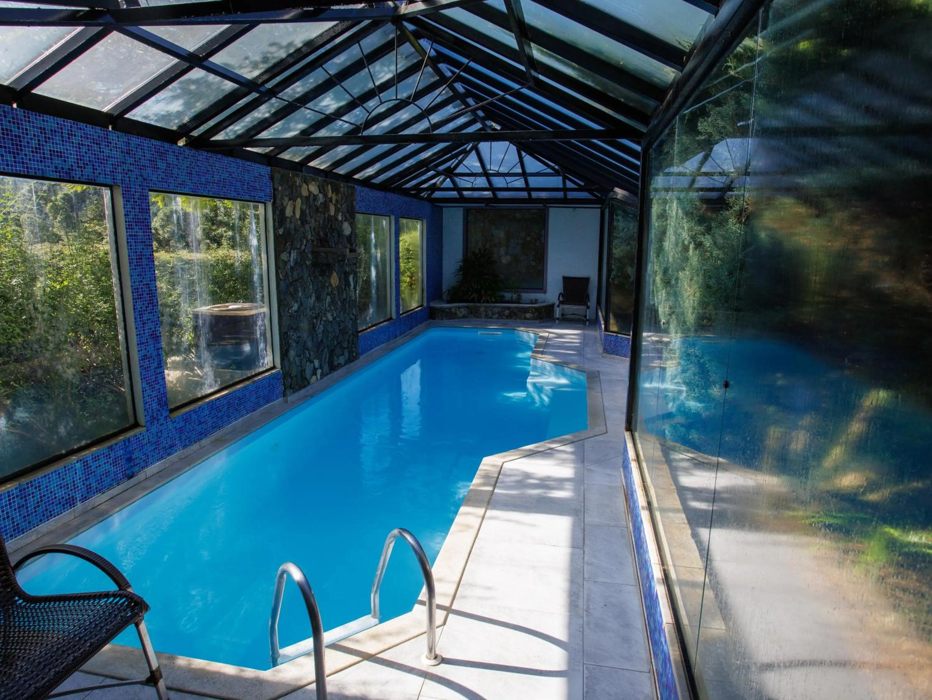 Swimming pool in Pousada Varanda das Colinas