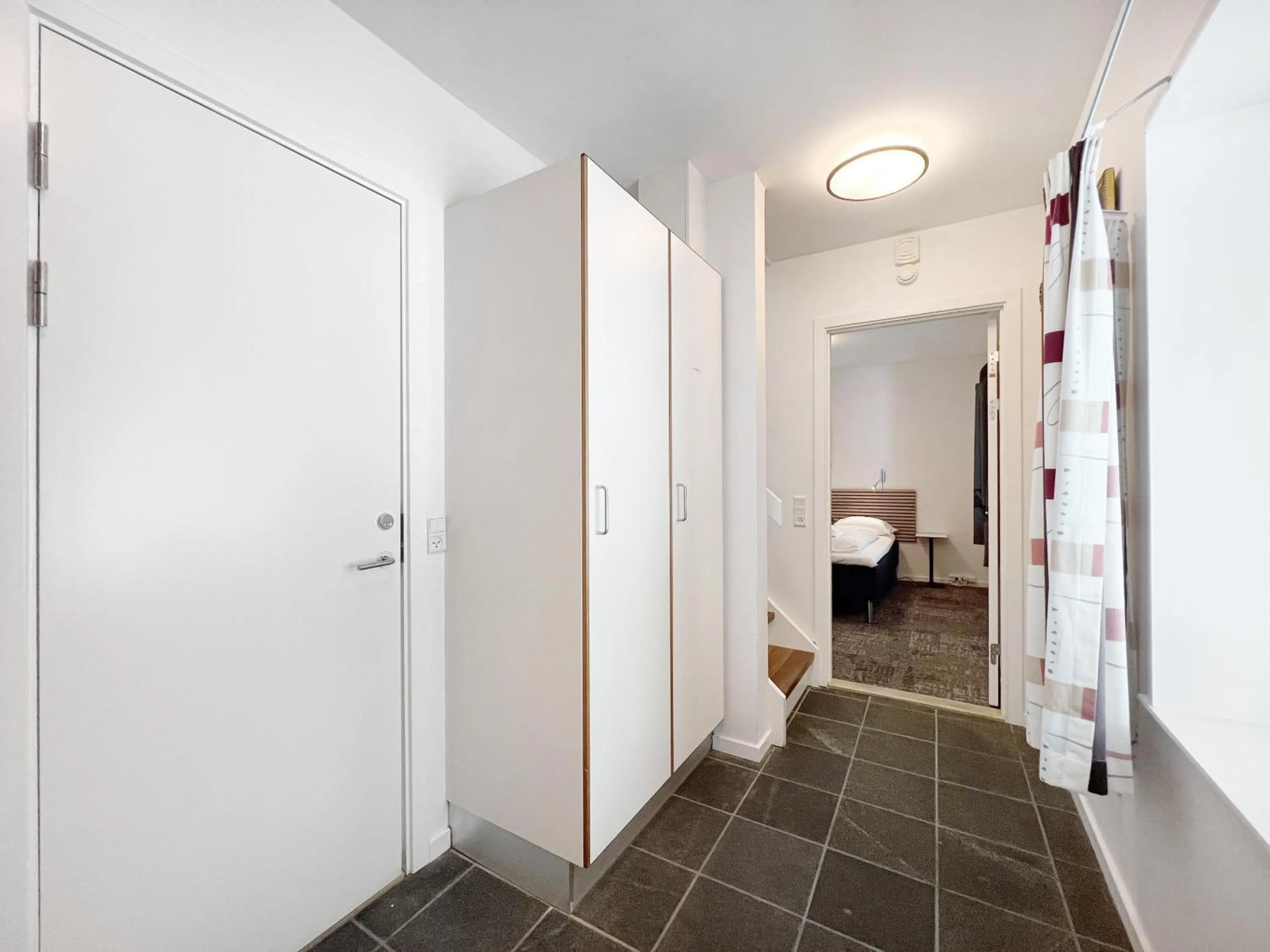 wardrobe, Bed in Hotel Nordbo