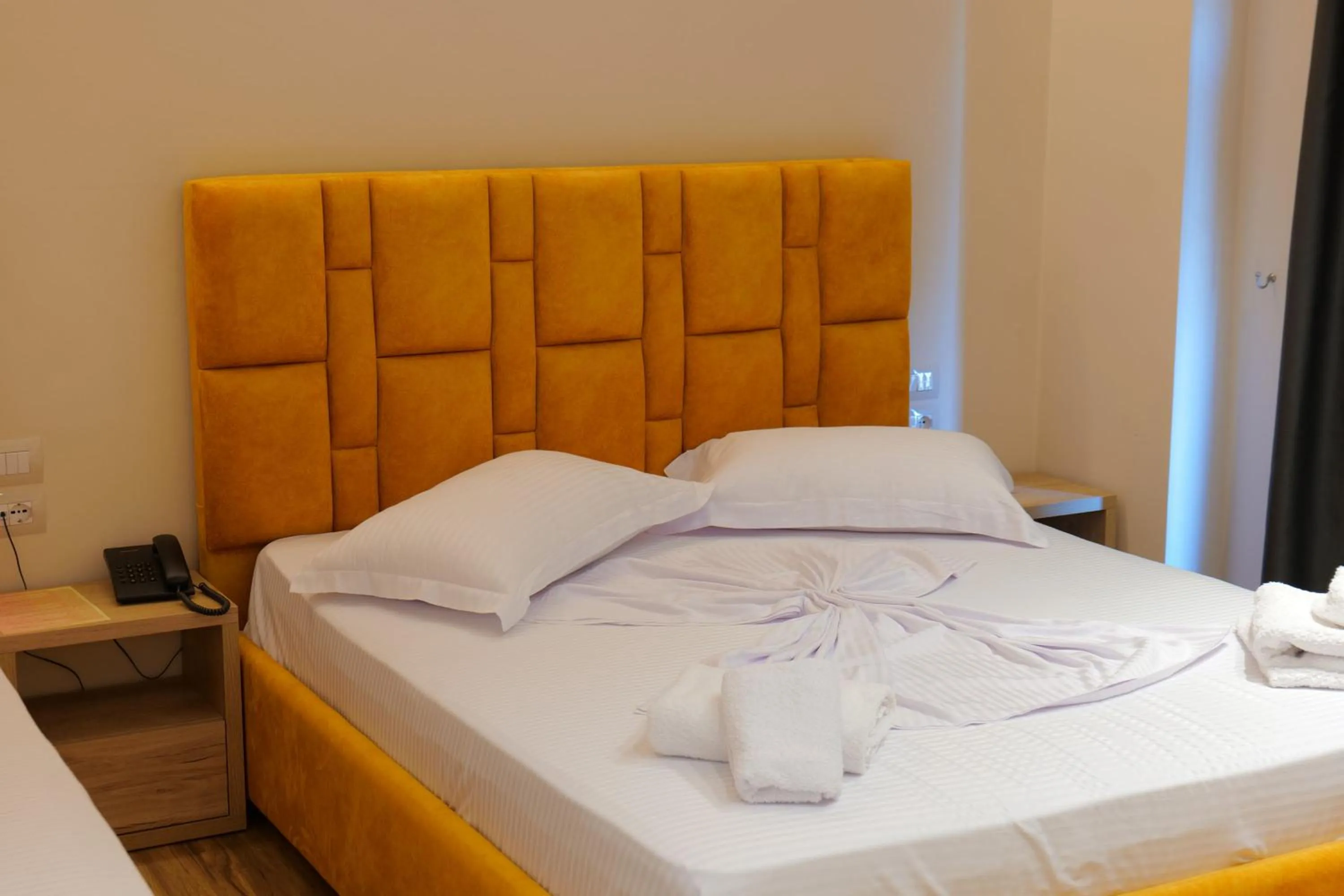 Bed in Hotel Alexander