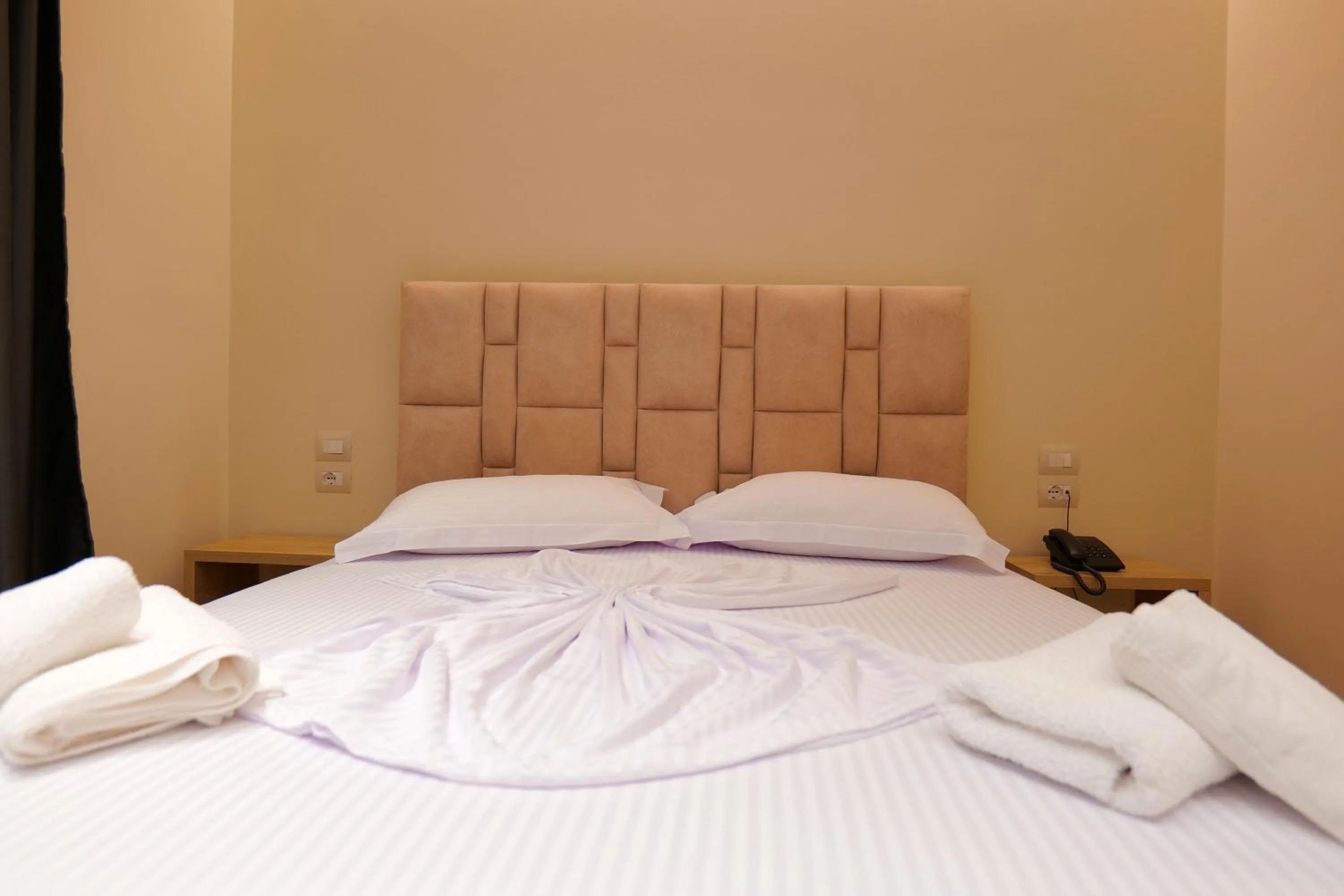 Bed in Hotel Alexander