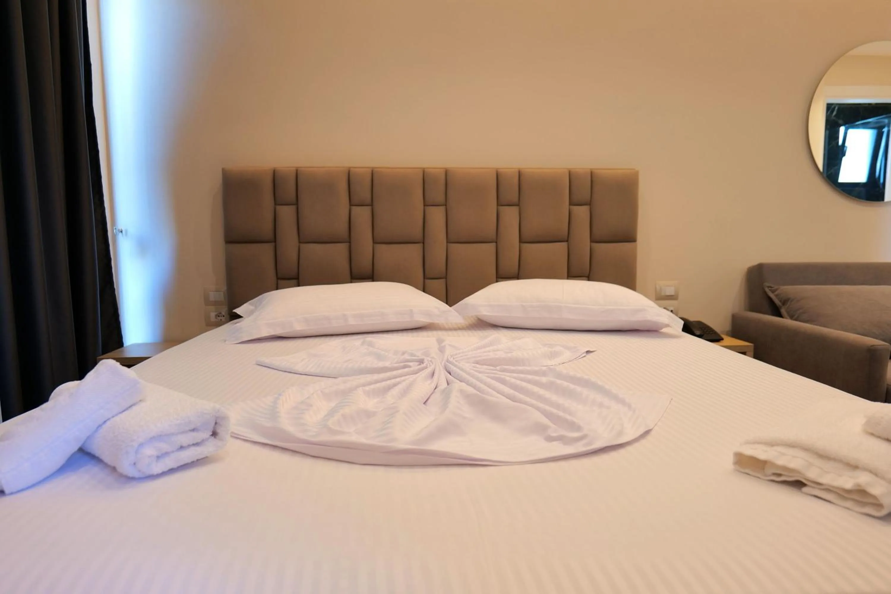 Bed in Hotel Alexander