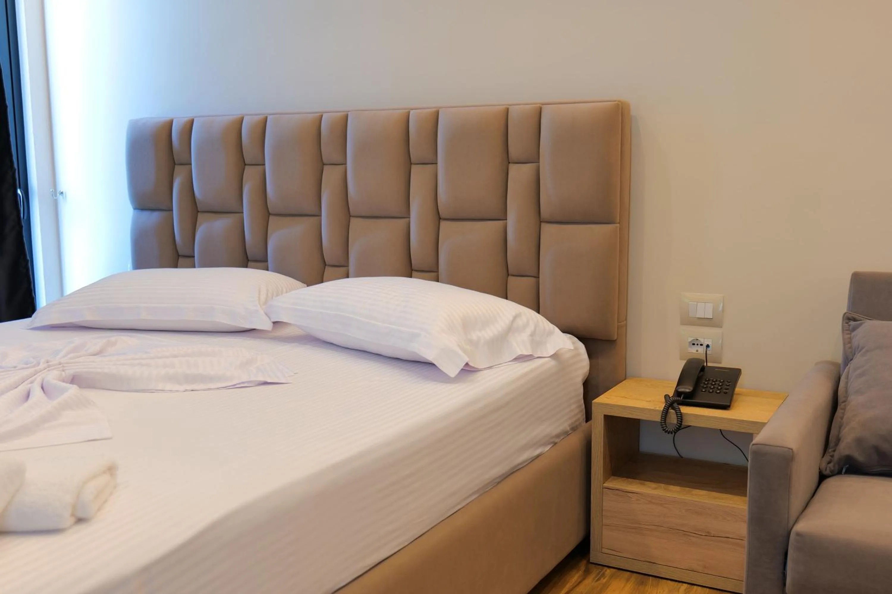 Bed in Hotel Alexander