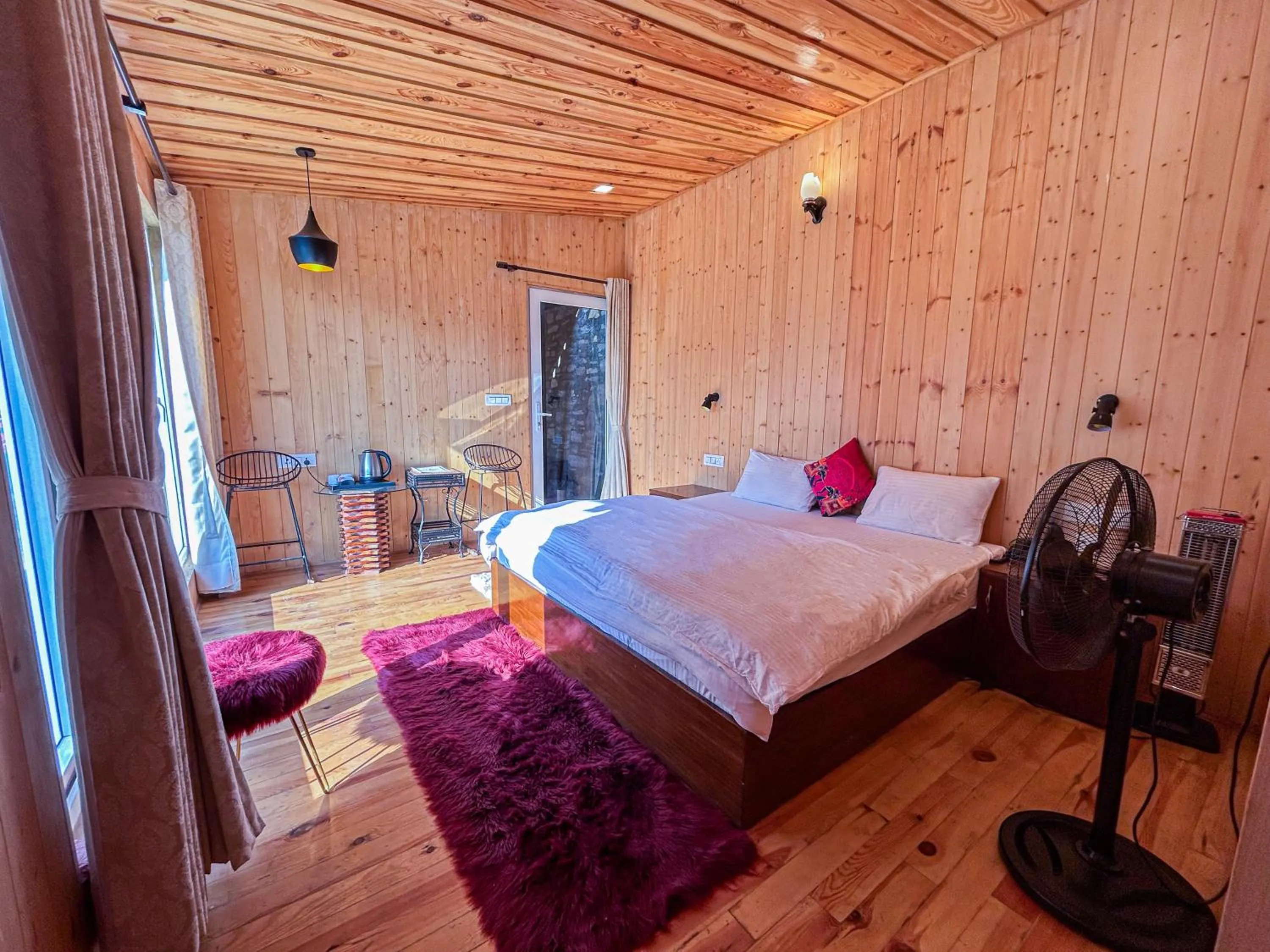 Photo of the whole room, Bed in THEHIMALAYANLIVING WHISTLING PINES