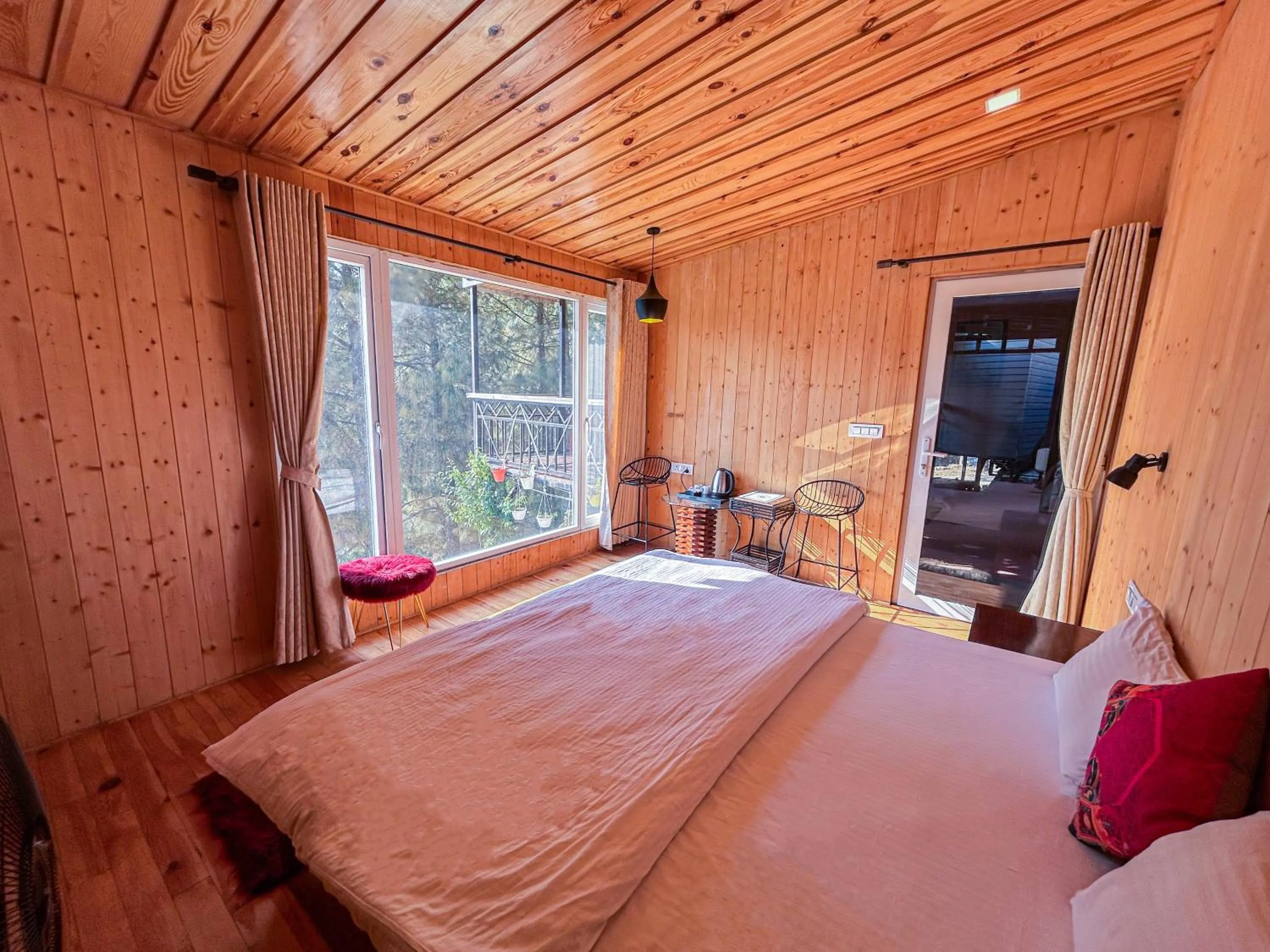 Photo of the whole room, Bed in THEHIMALAYANLIVING WHISTLING PINES