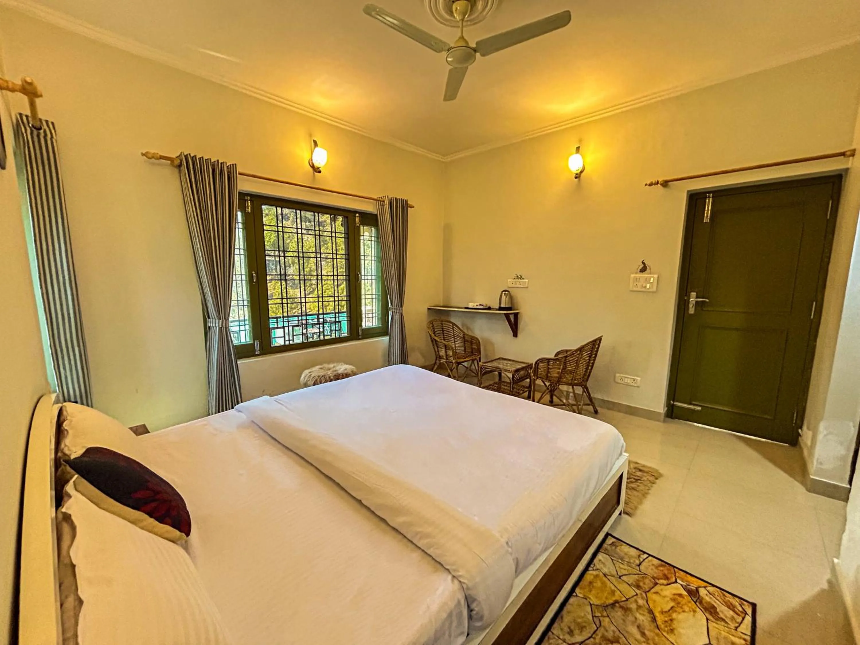 Photo of the whole room, Bed in THEHIMALAYANLIVING WHISTLING PINES