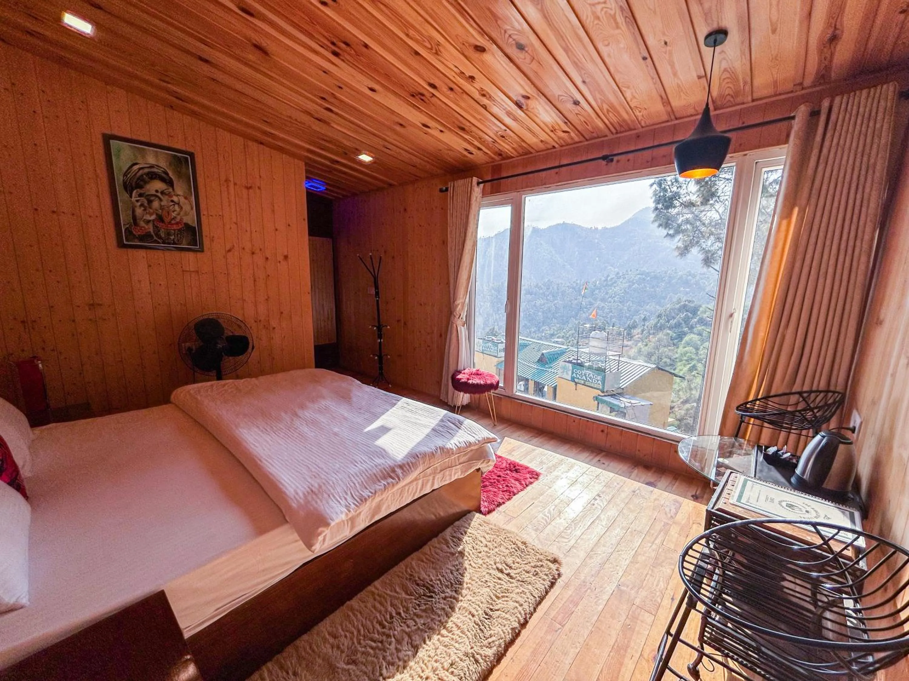 Photo of the whole room, Bed in THEHIMALAYANLIVING WHISTLING PINES
