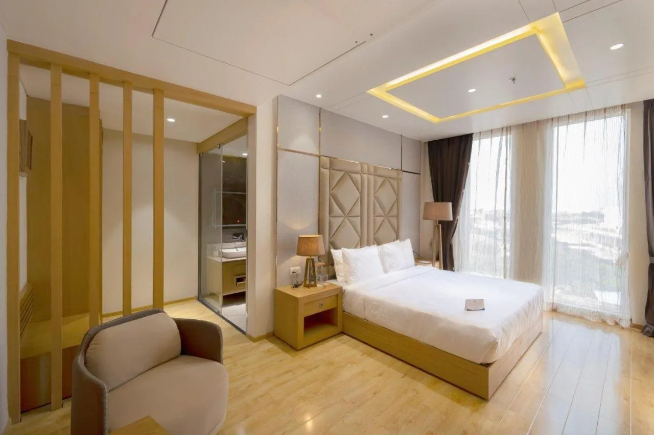 Bedroom in Sarovar Portico Morbi