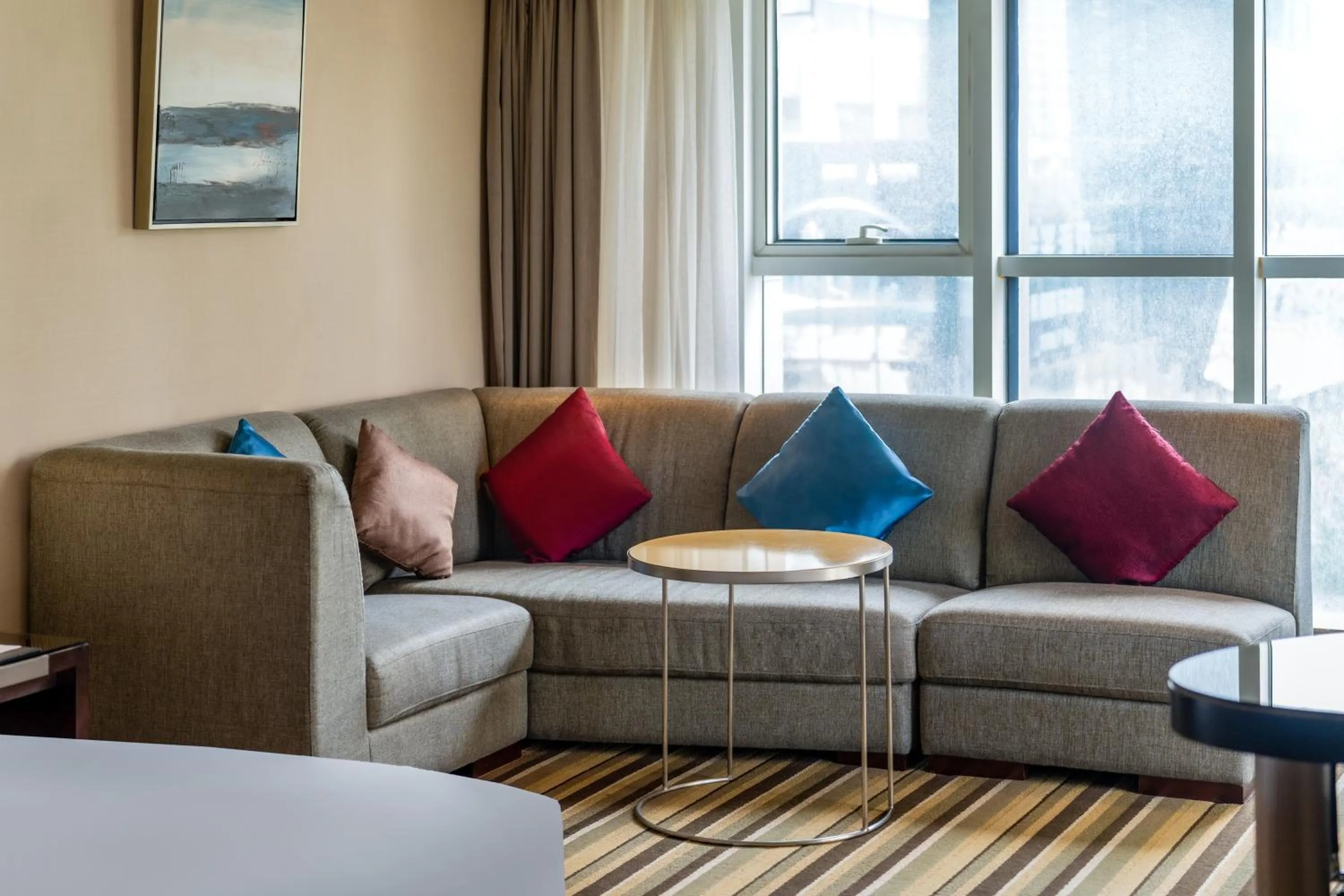 Living room in Holiday Inn Express Shenyang Golden Corridor by IHG