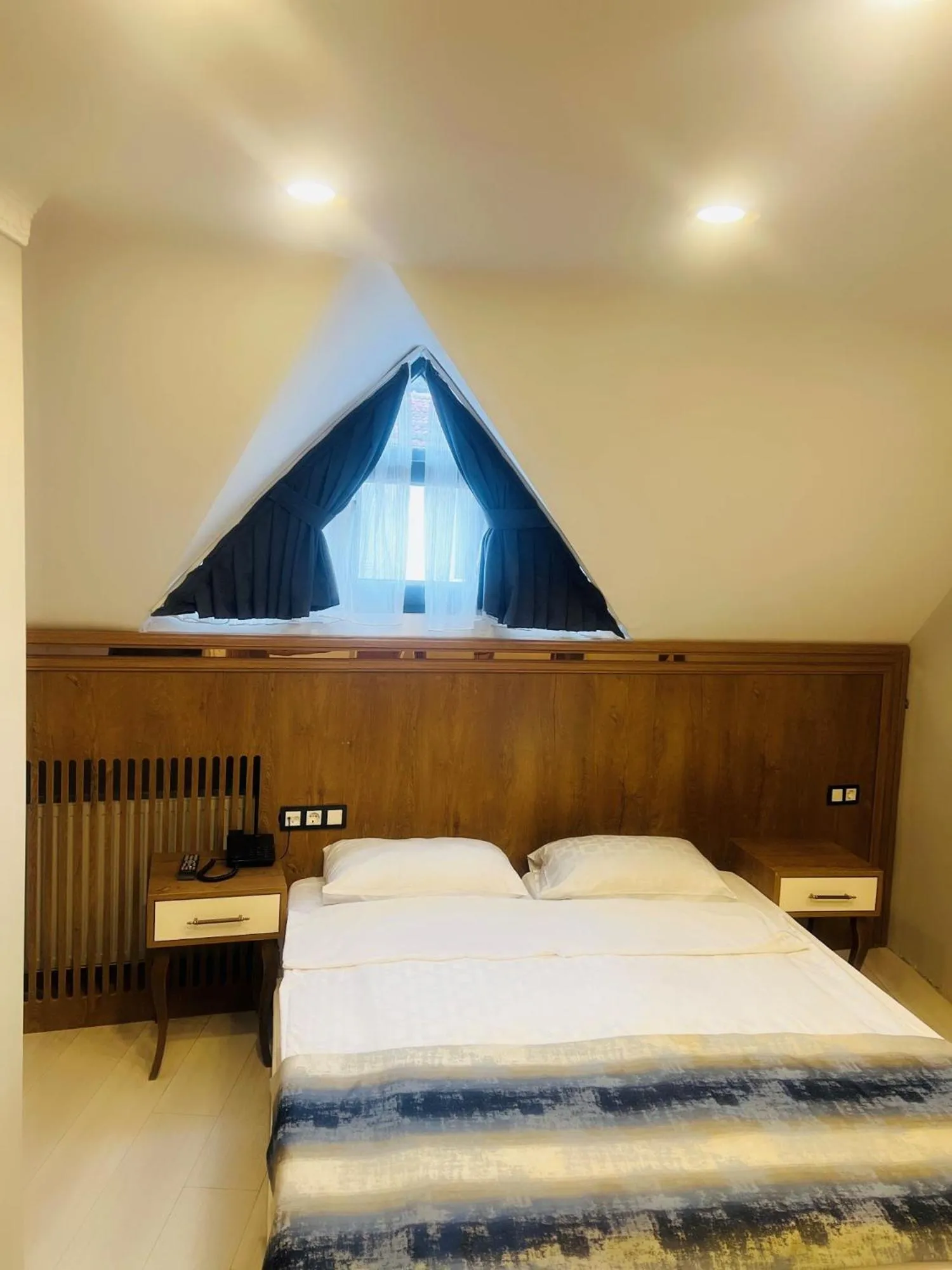 Bed in Crowned Hotel