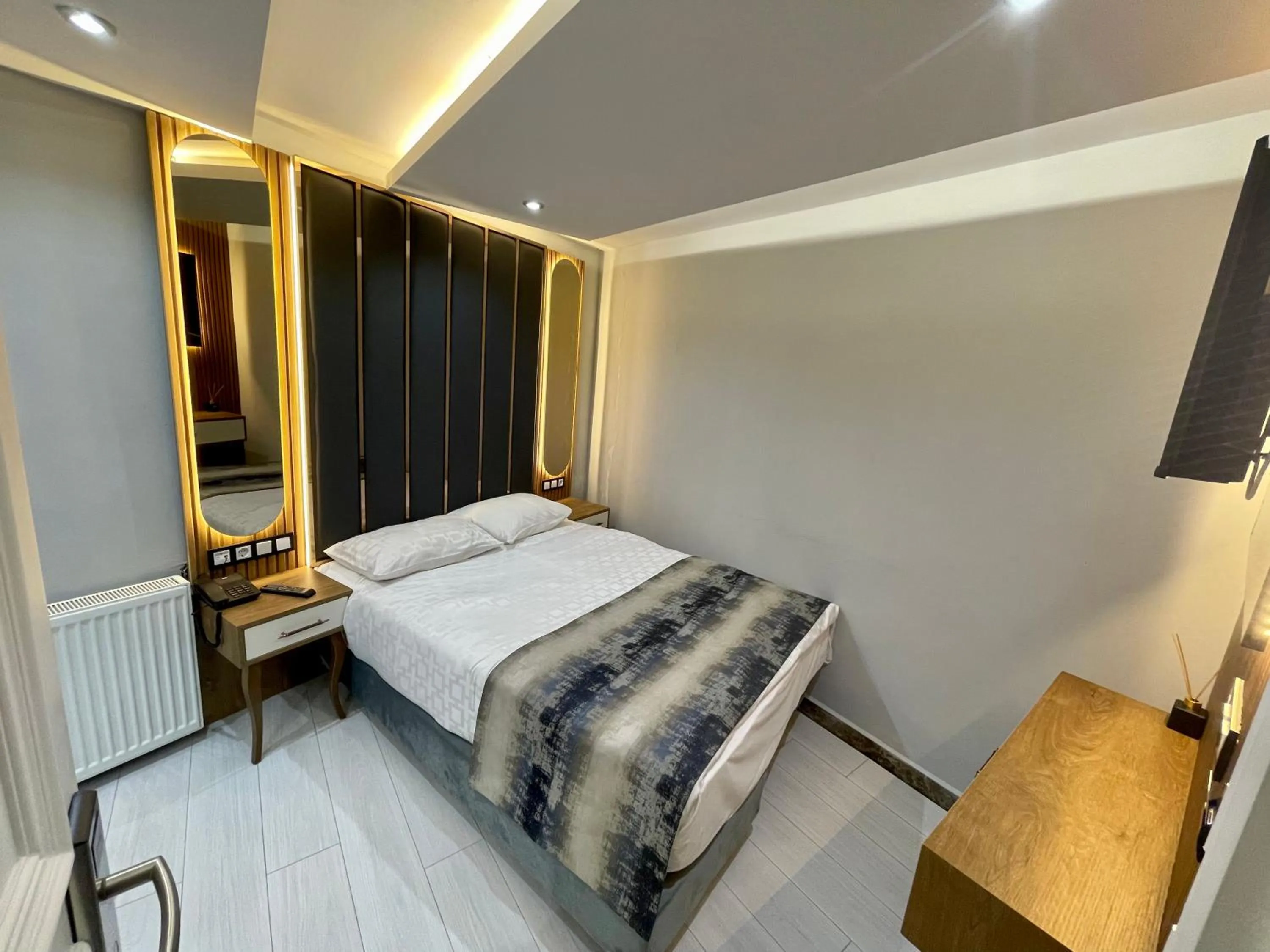 Bed in Crowned Hotel