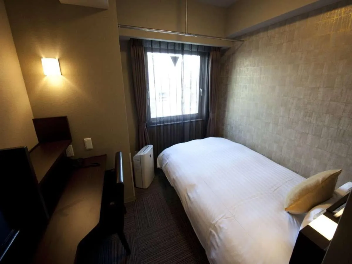 Bed in Dormy Inn Premium Namba Natural Hot Spring