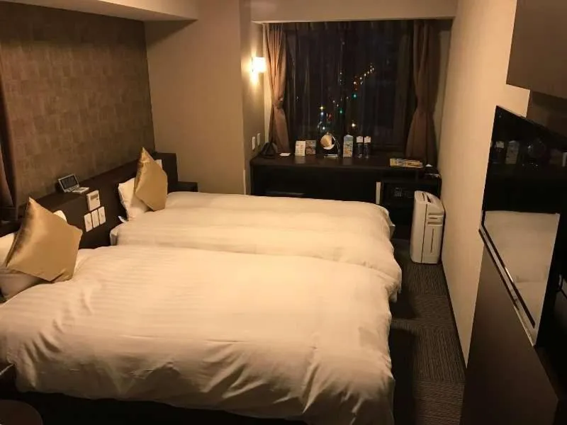 Bed in Dormy Inn Premium Namba Natural Hot Spring