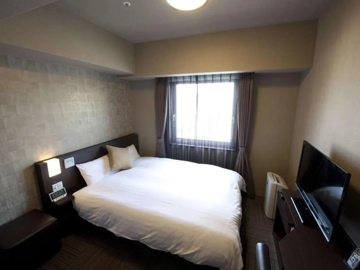 Bed in Dormy Inn Premium Namba Natural Hot Spring