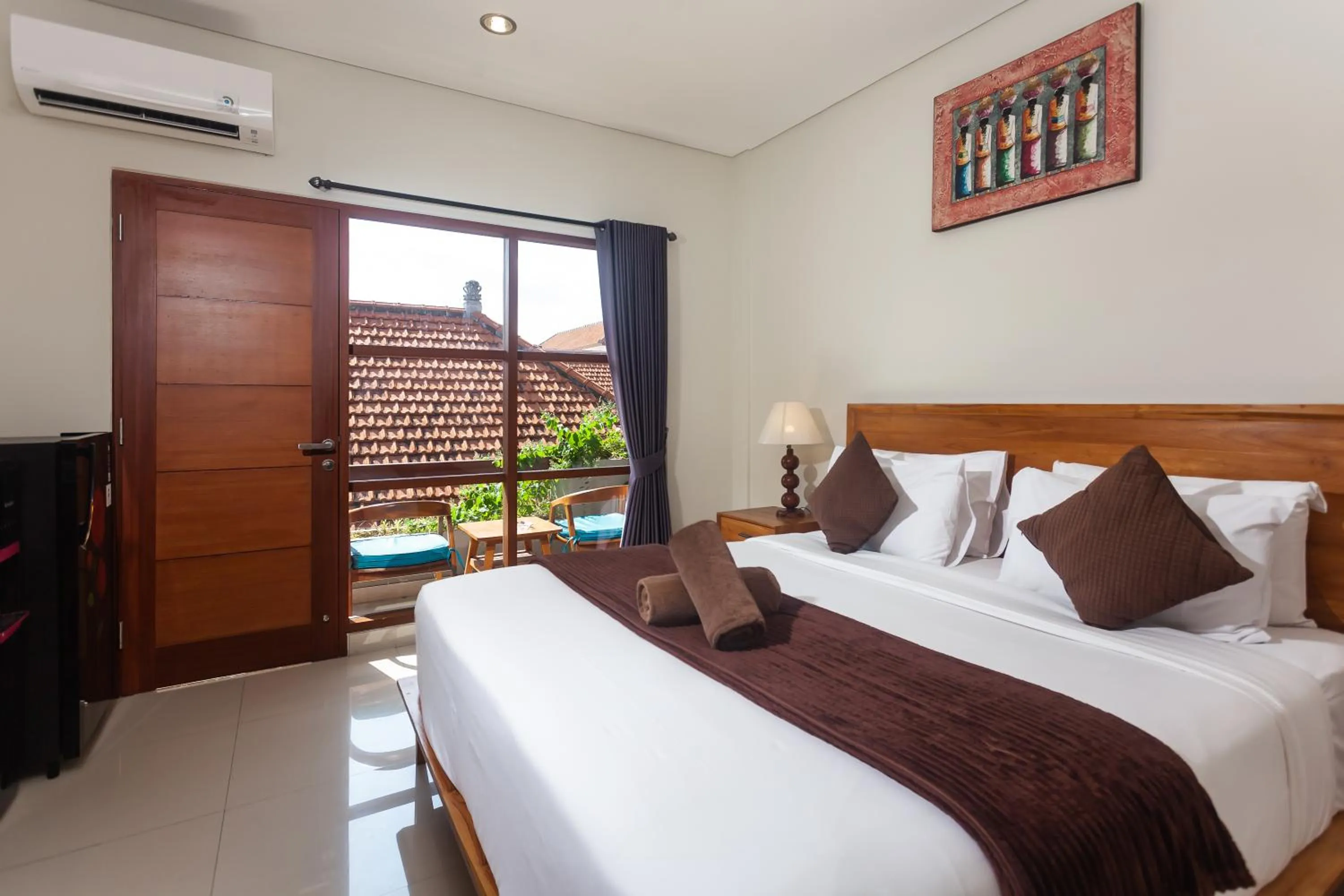 Bed in Naksa Homestay Sanur