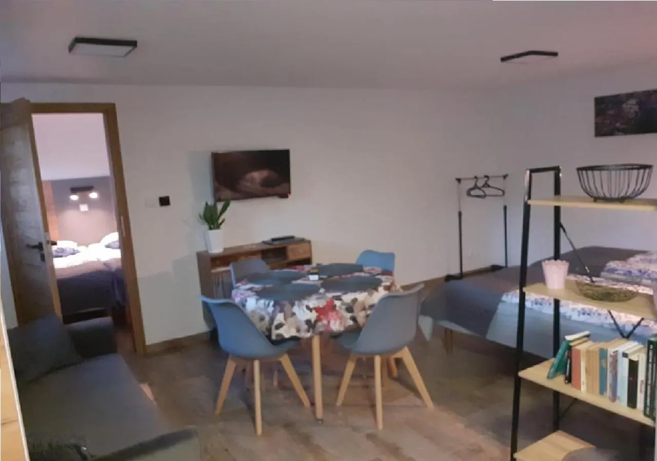 Seating area, Bed in Przystanek Tykocin - apartamenty gościnne