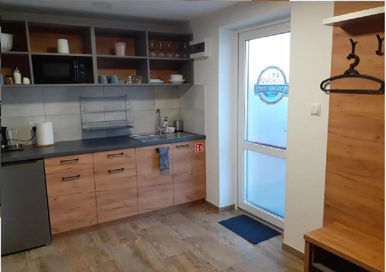 Kitchen or kitchenette in Przystanek Tykocin - apartamenty gościnne