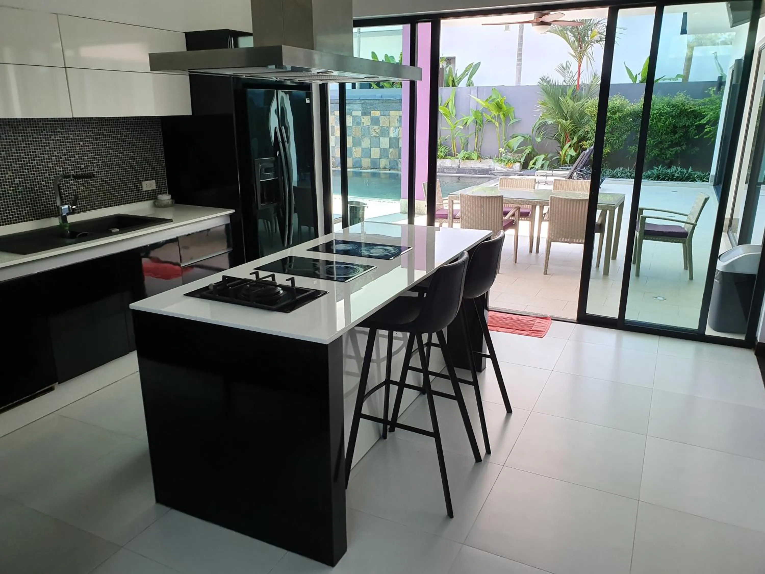 Kitchen or kitchenette in Eden Villa Phuket