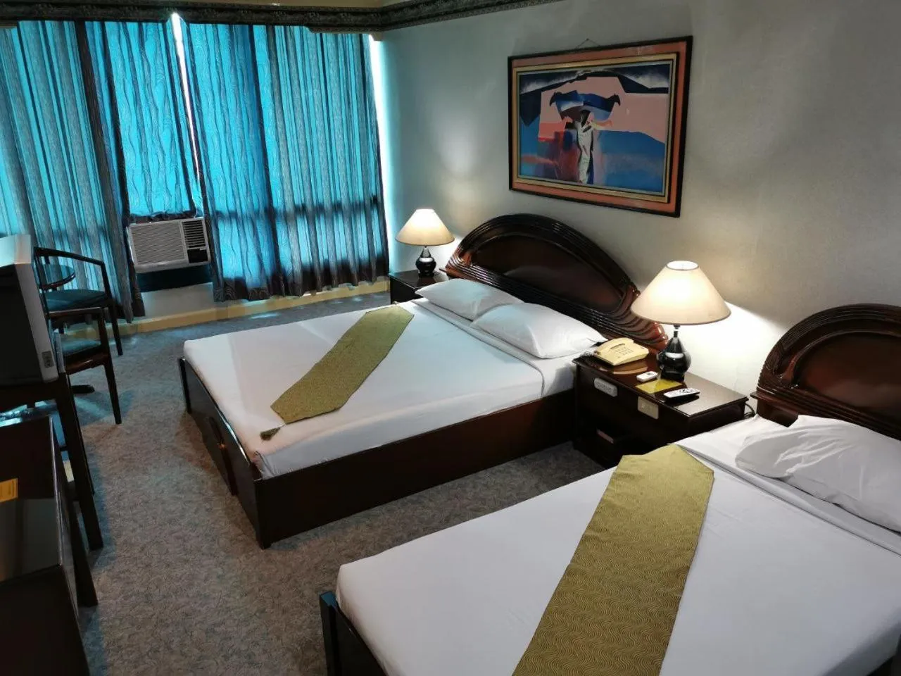 Bedroom, Bed in Holiday Plaza Hotel - Cebu