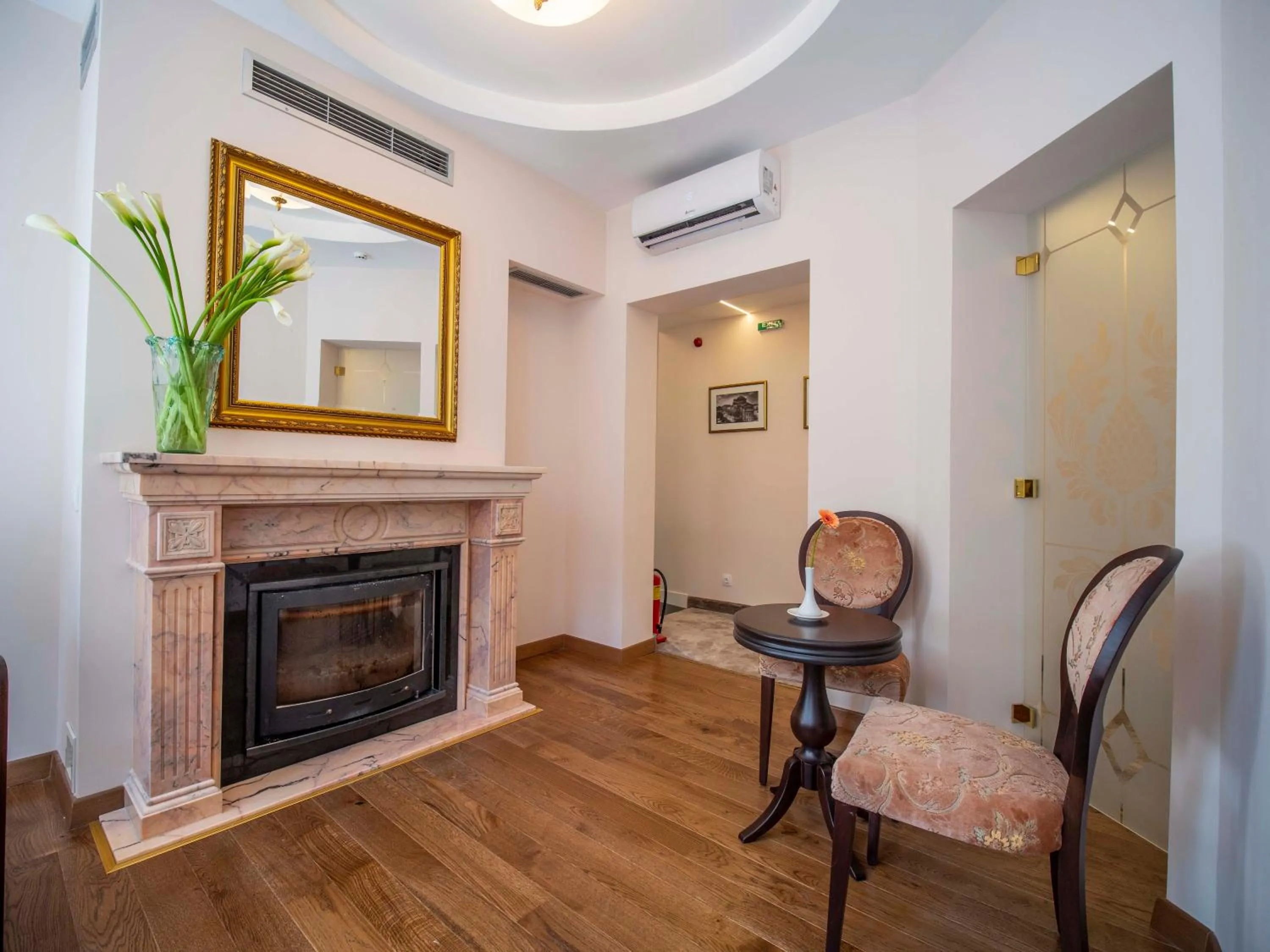 Communal lounge/ TV room in The Moon Boutique Hotel