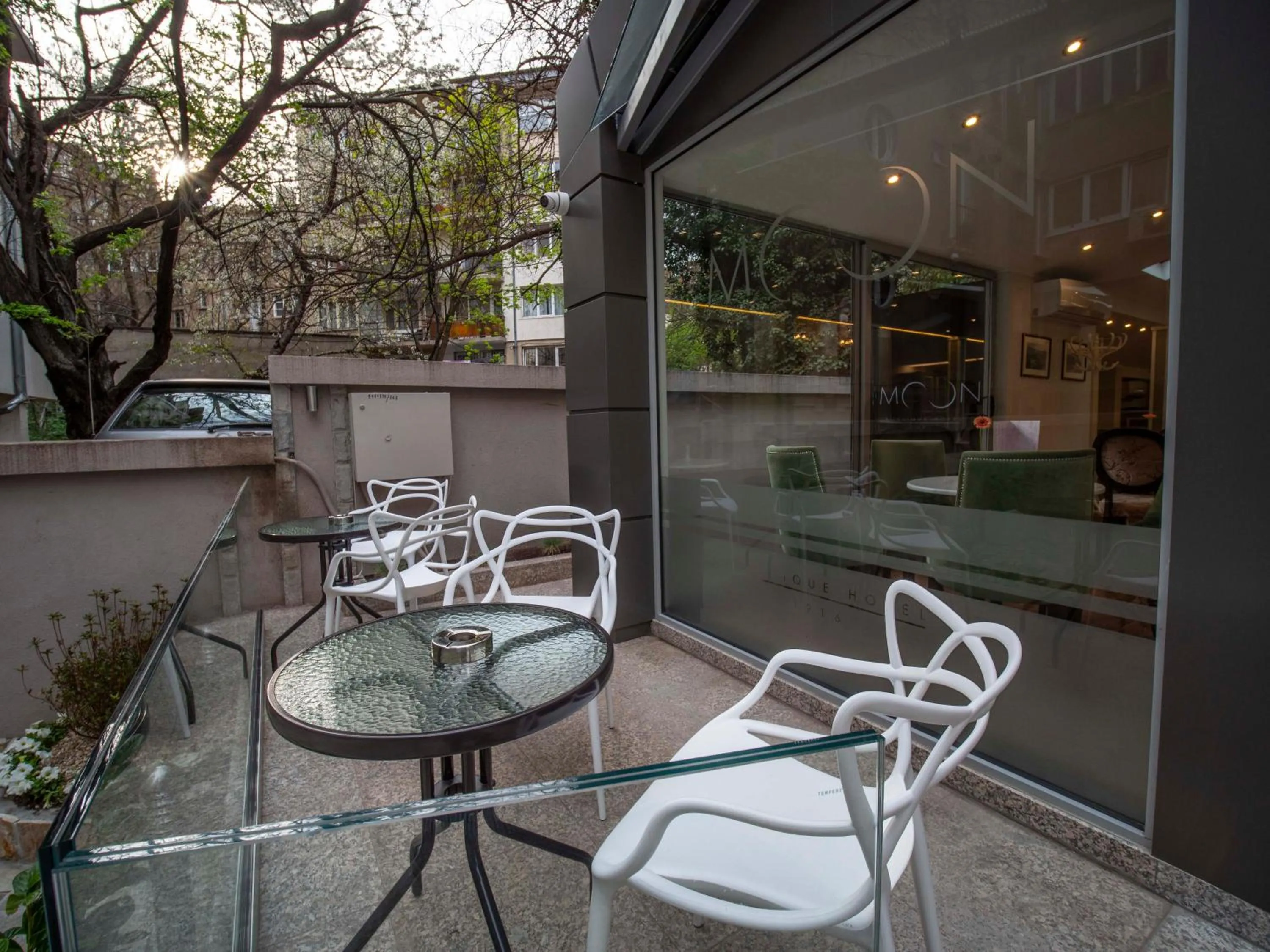 Communal lounge/ TV room in The Moon Boutique Hotel