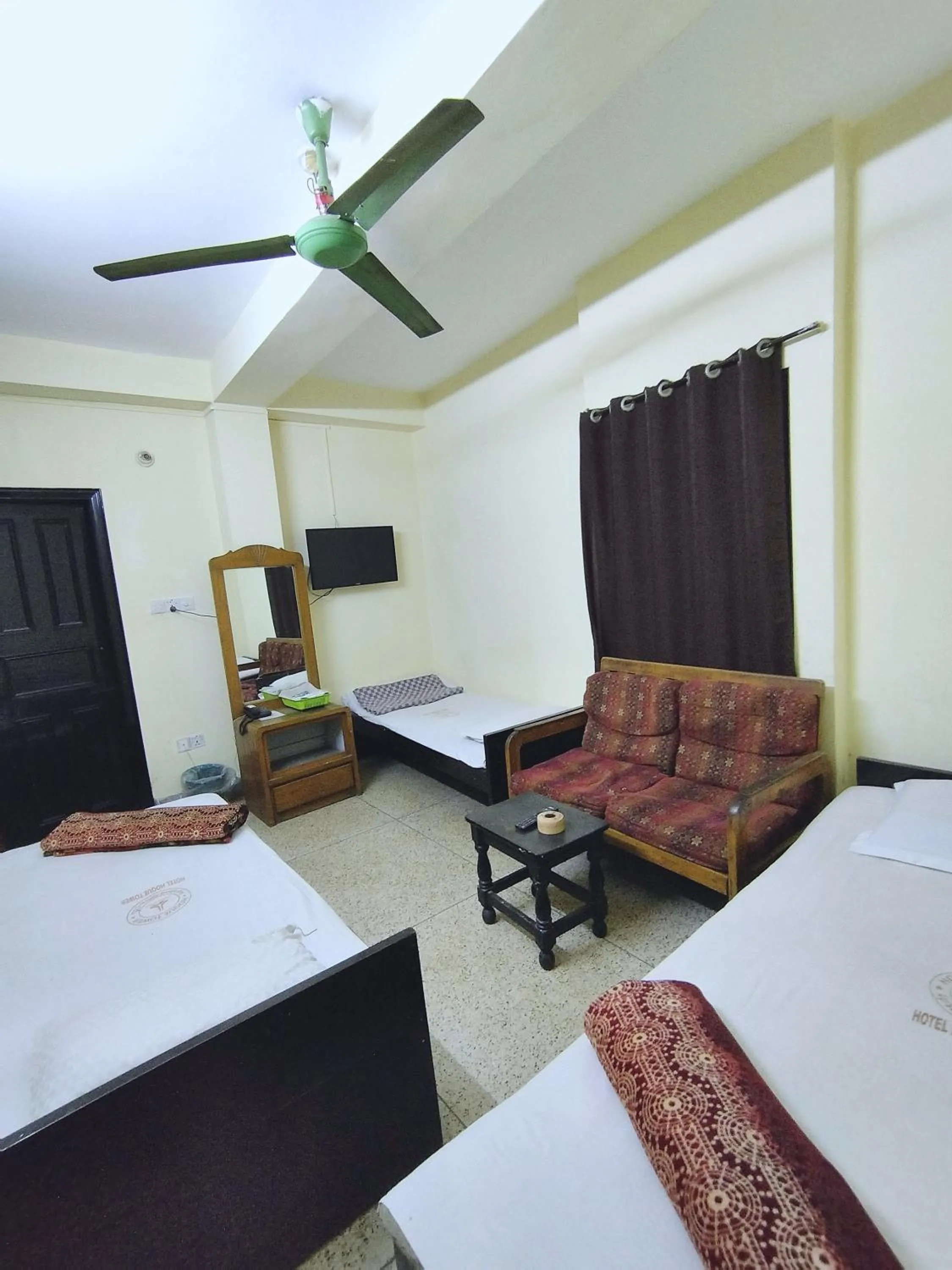 Bed in Hotel Hoque Tower International