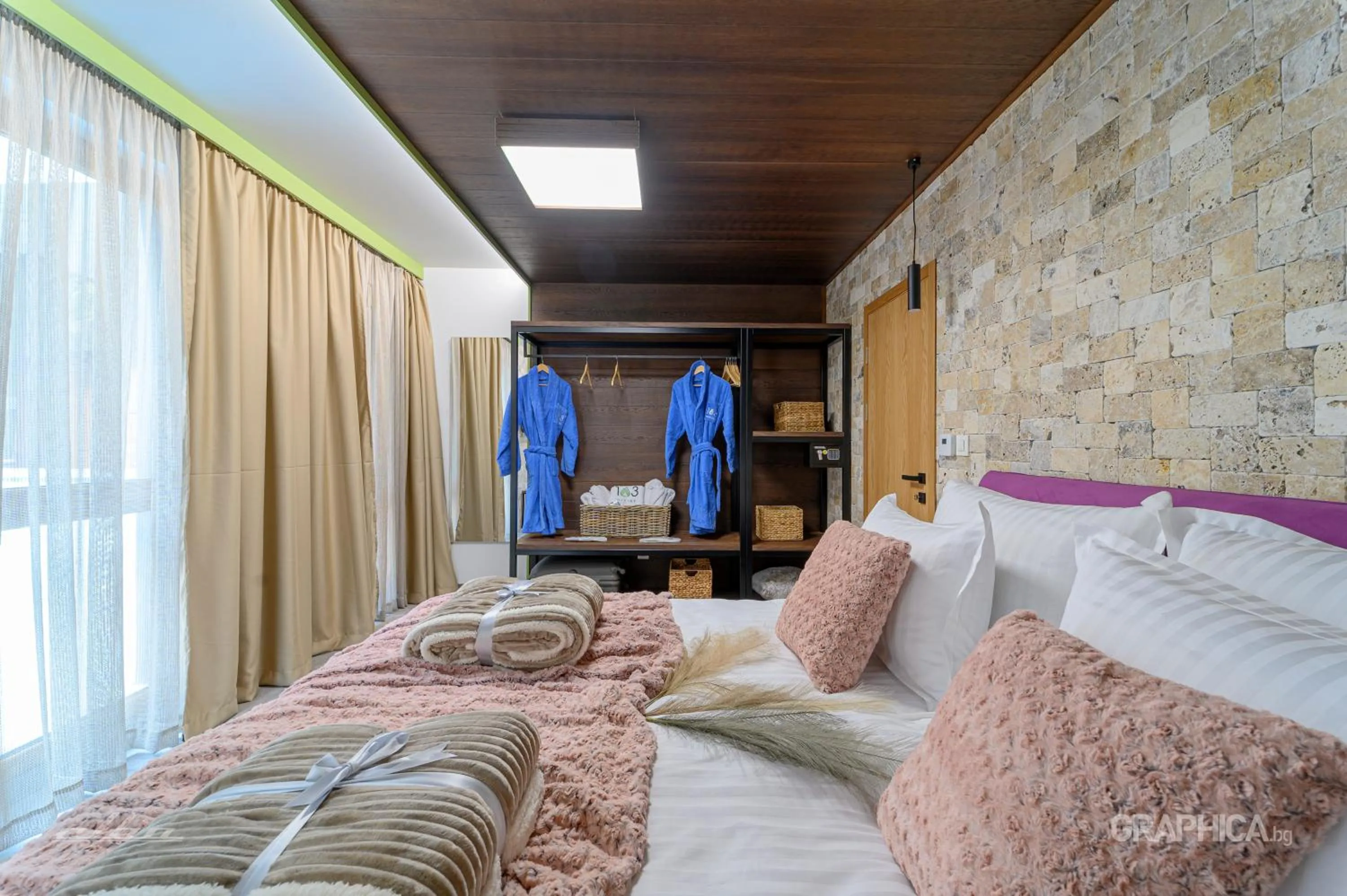 Bed in 103 Alpine Hotel