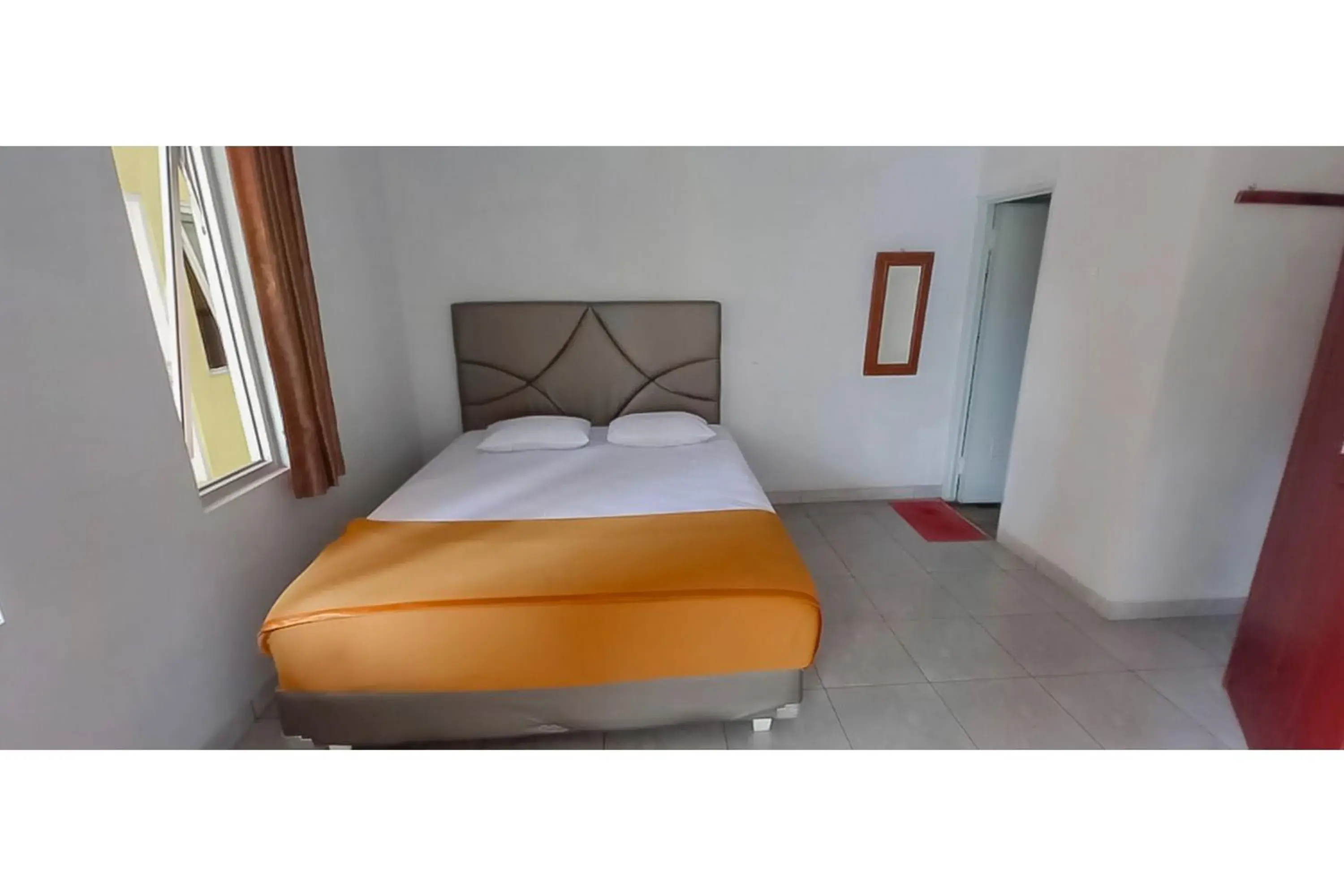 Standard Double Room in Hotel Sri Indrawati Puncak Mitra RedDoorz Standard Double Room in Hotel Sri Indrawati Puncak Mitra RedDoorz