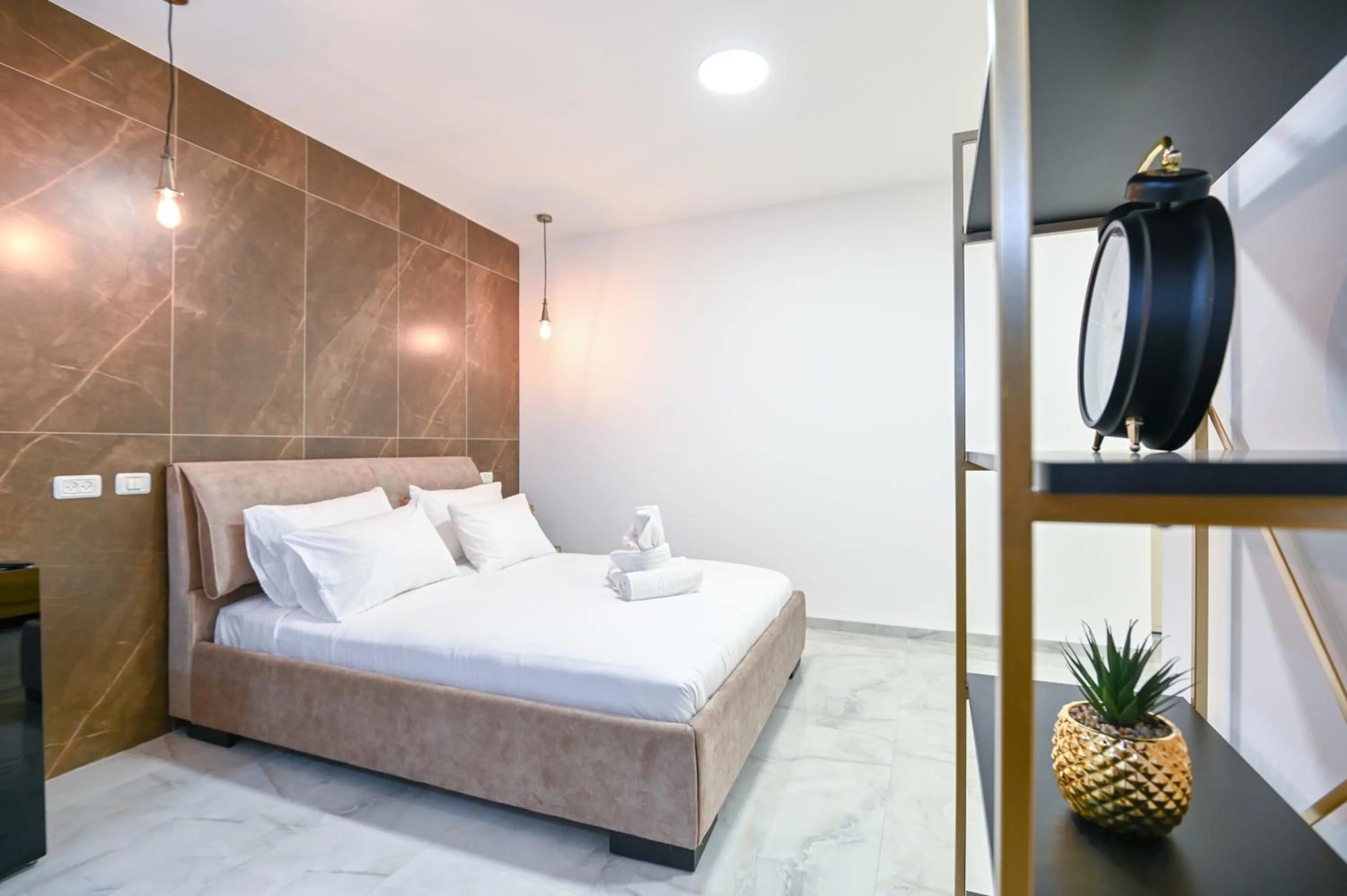 Bed in Lake Mansion Boutique Apartments