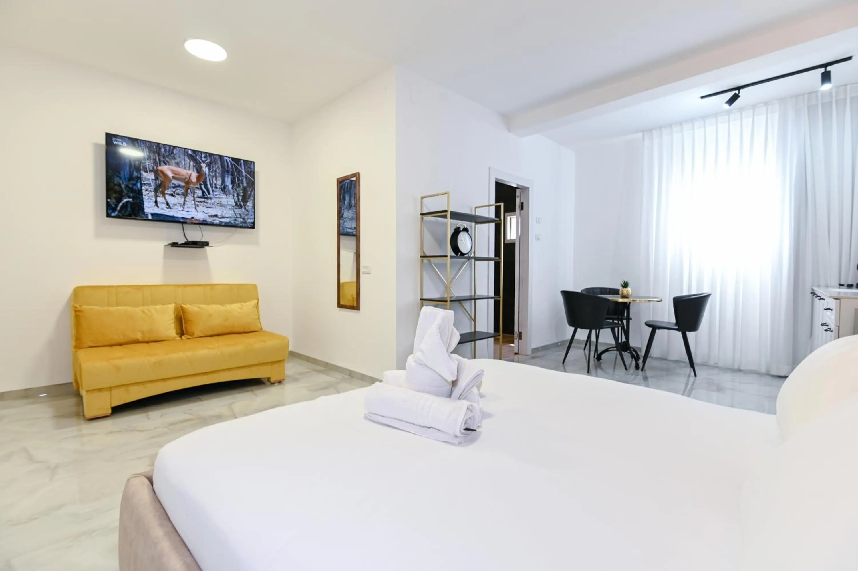 Bed in Lake Mansion Boutique Apartments