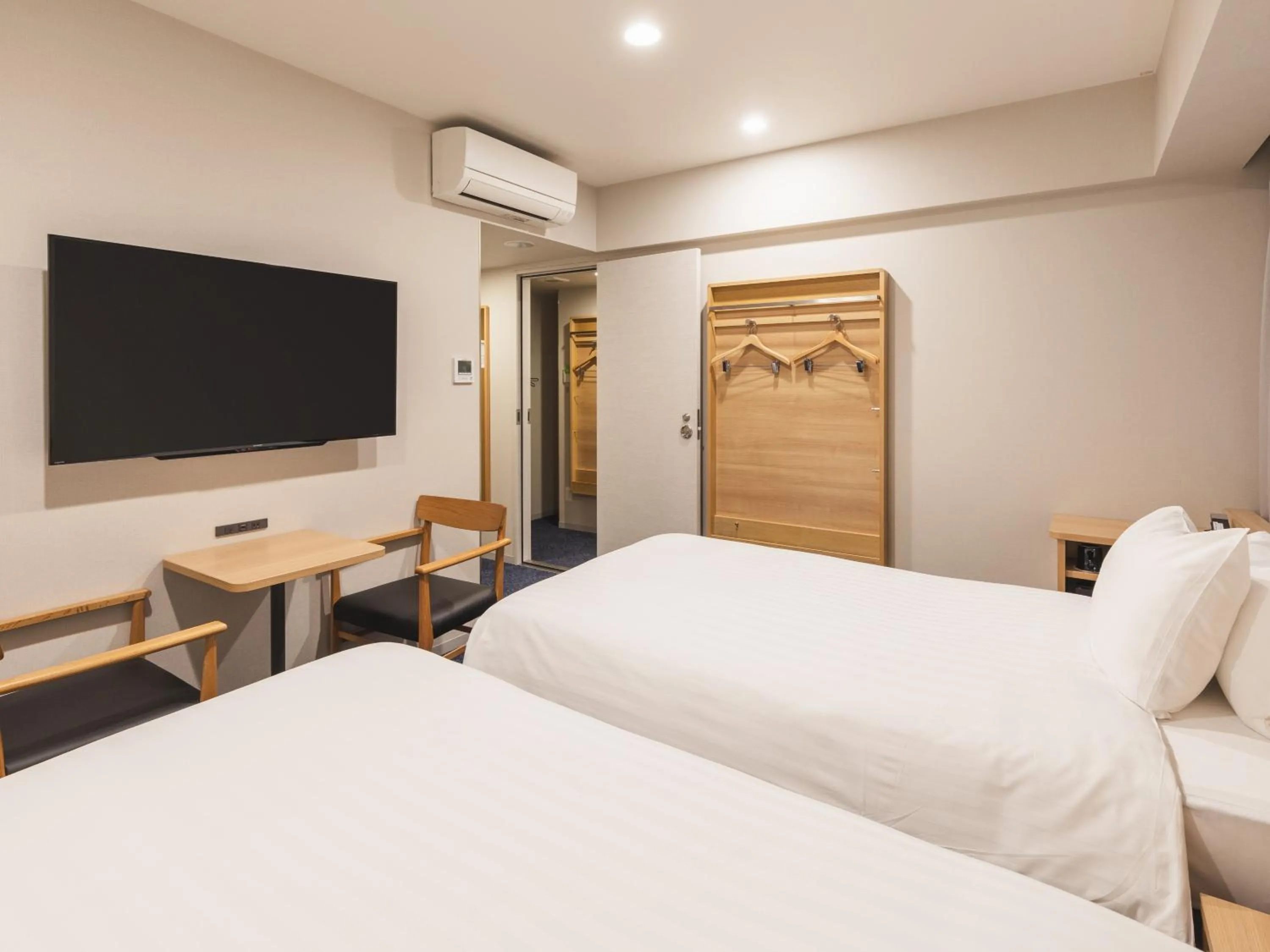 Bed in Sotetsu Fresa Inn Hiroshima