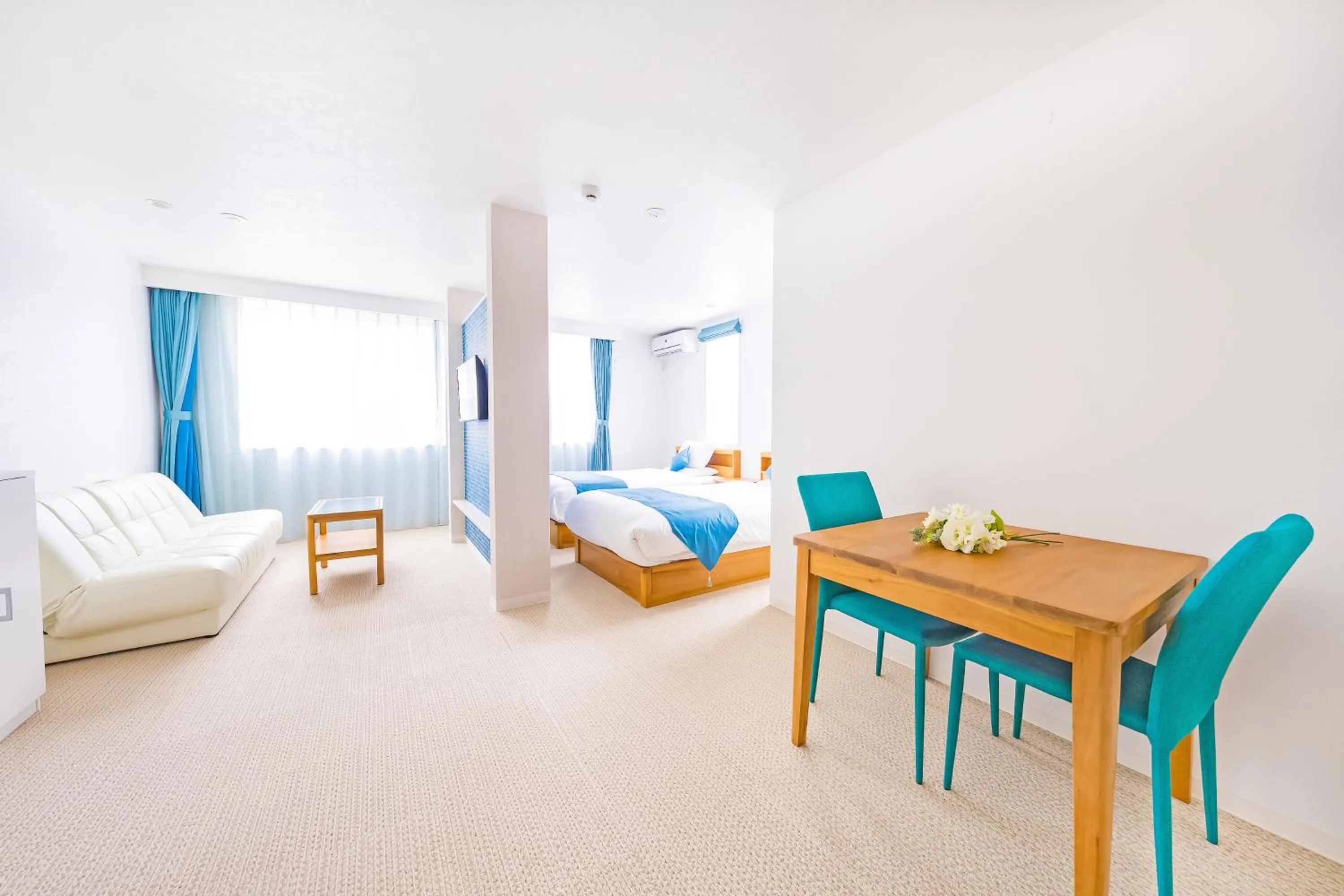 Bed in Hotel California Miyakojima Resort