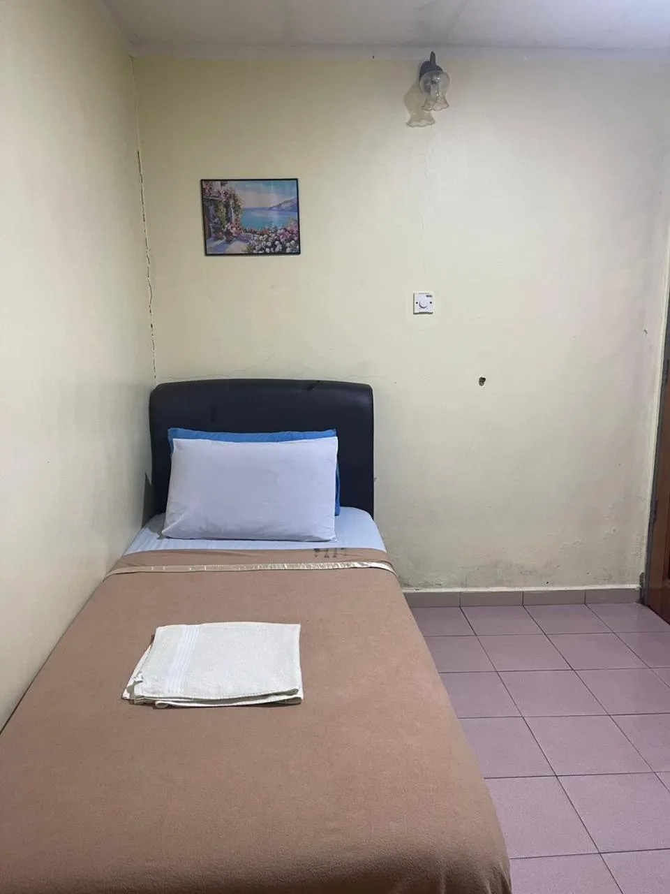 Bedroom in OYO 90914 Hotel Mei Wah