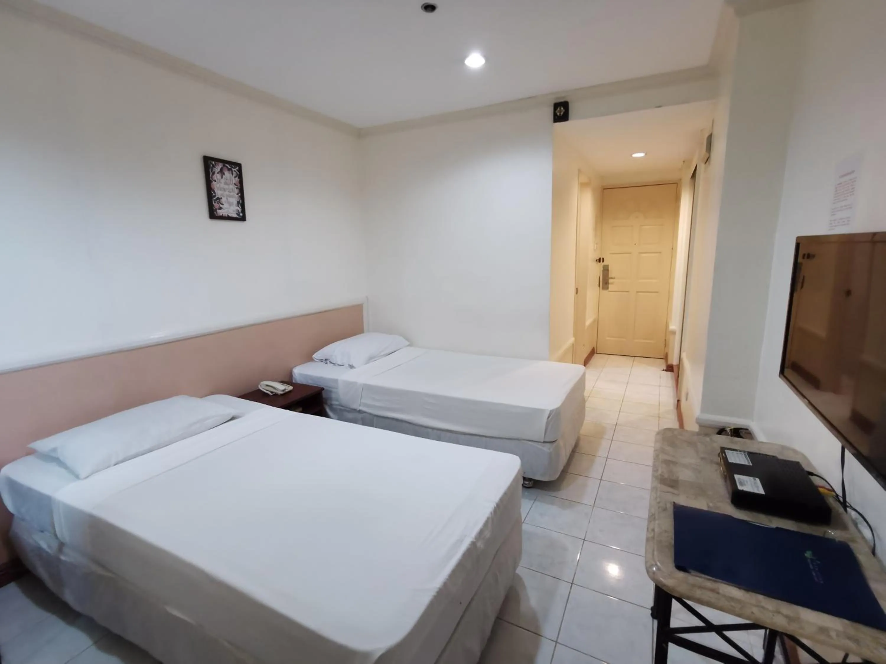 Bed in Metro Park Hotel - Cebu City