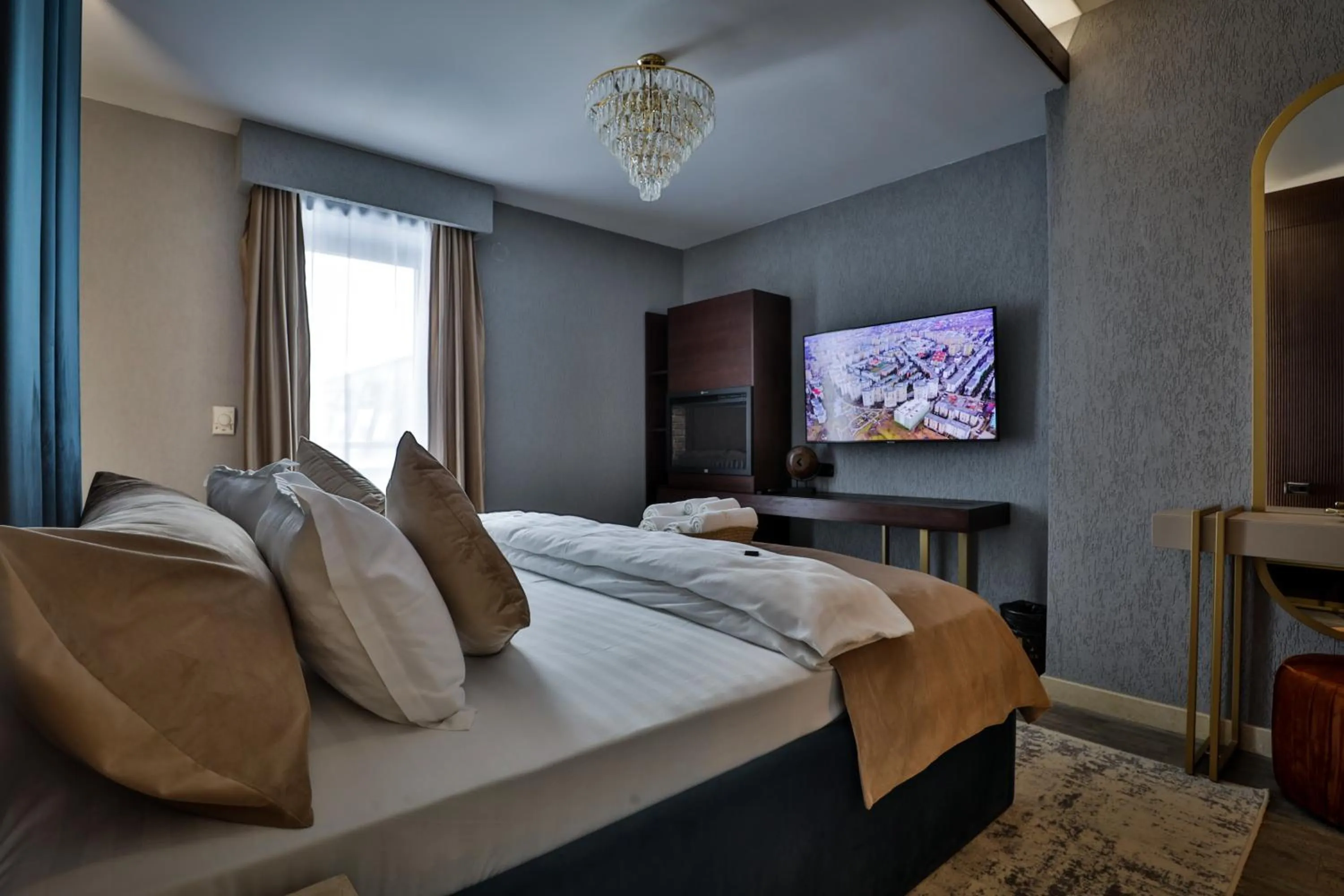 Bed in Elexus Apartments Poiana Brasov