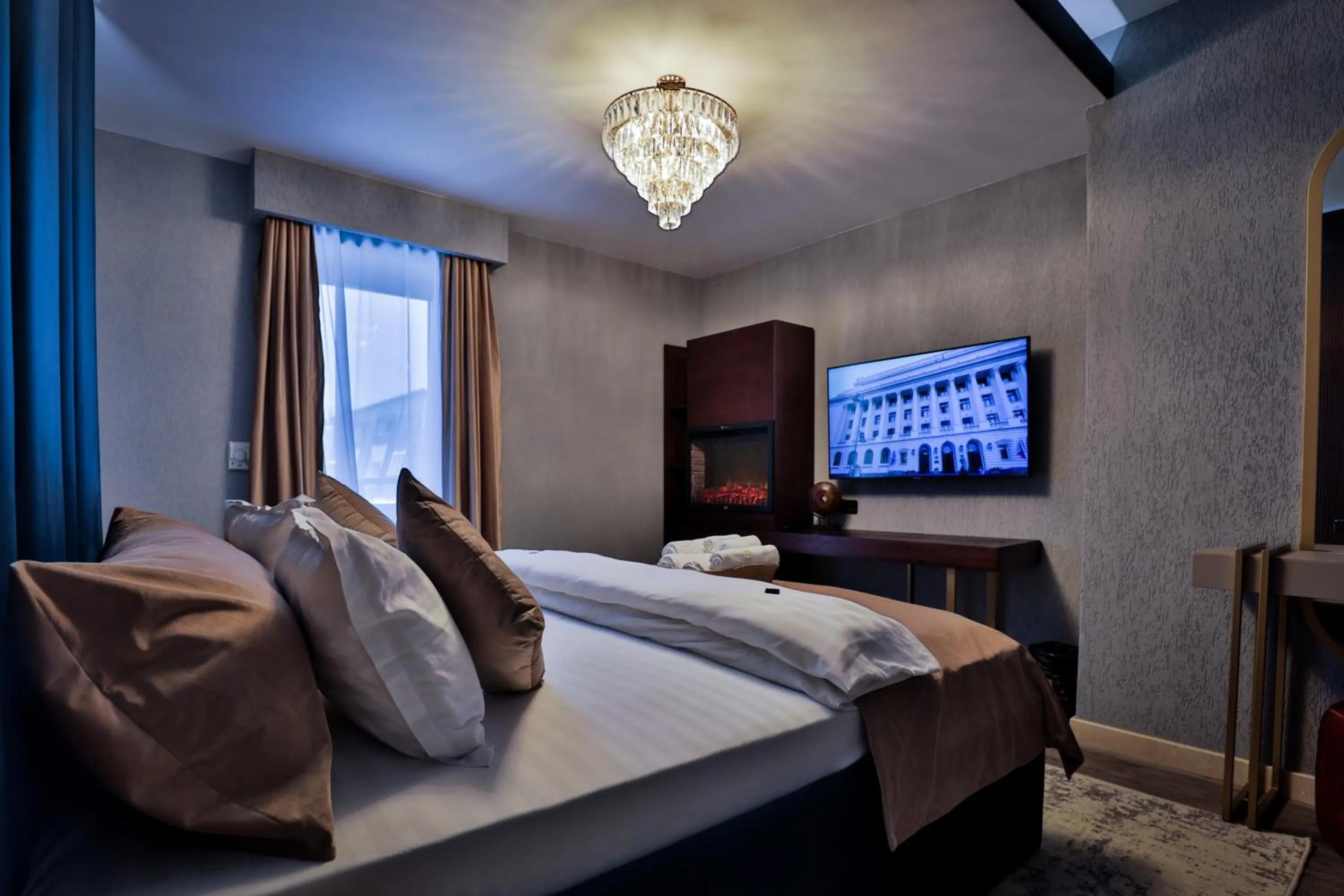 Bed in Elexus Apartments Poiana Brasov