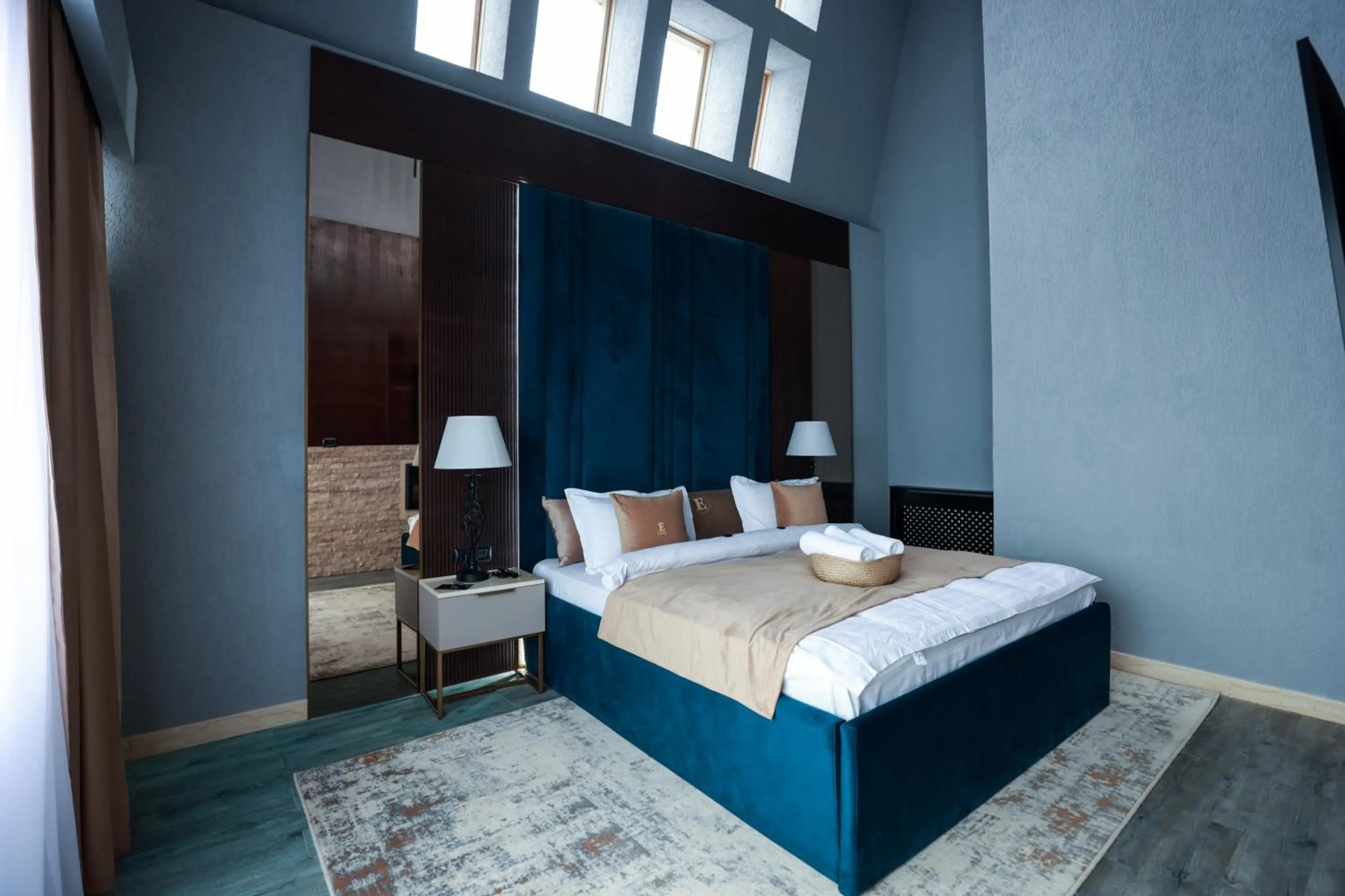 Bed in Elexus Apartments Poiana Brasov