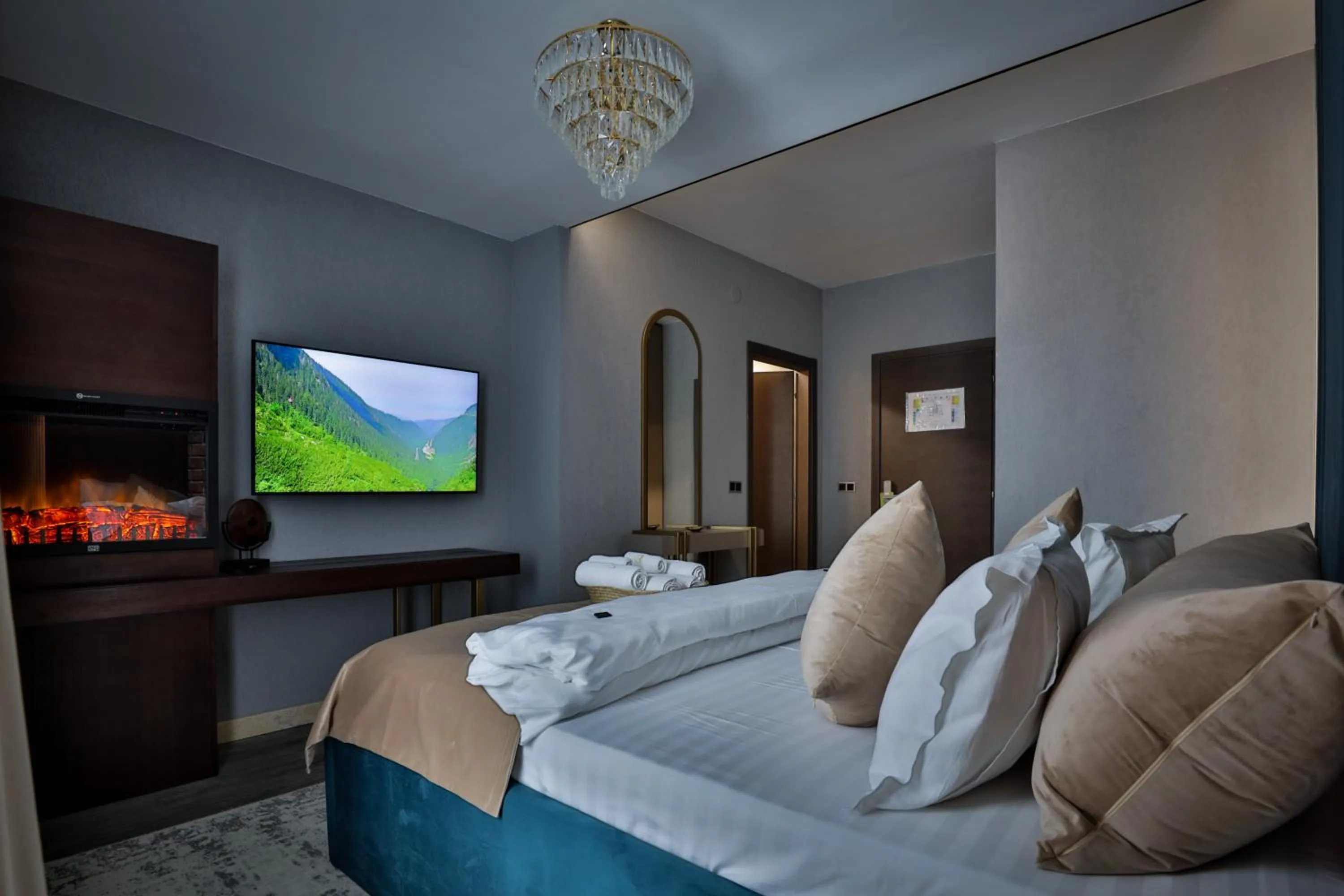 Bed in Elexus Apartments Poiana Brasov