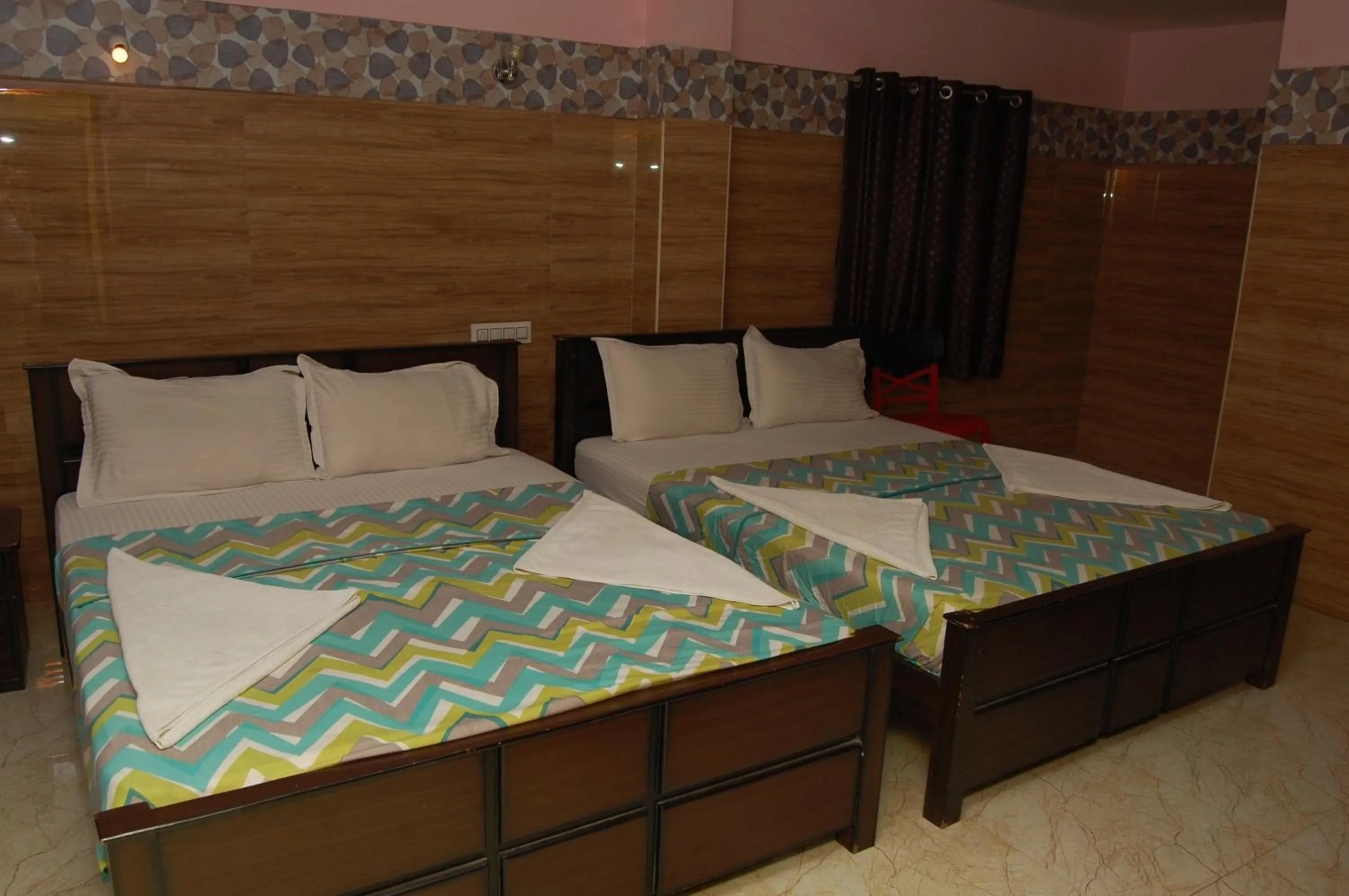 Photo of the whole room, Bed in Adhi Residency