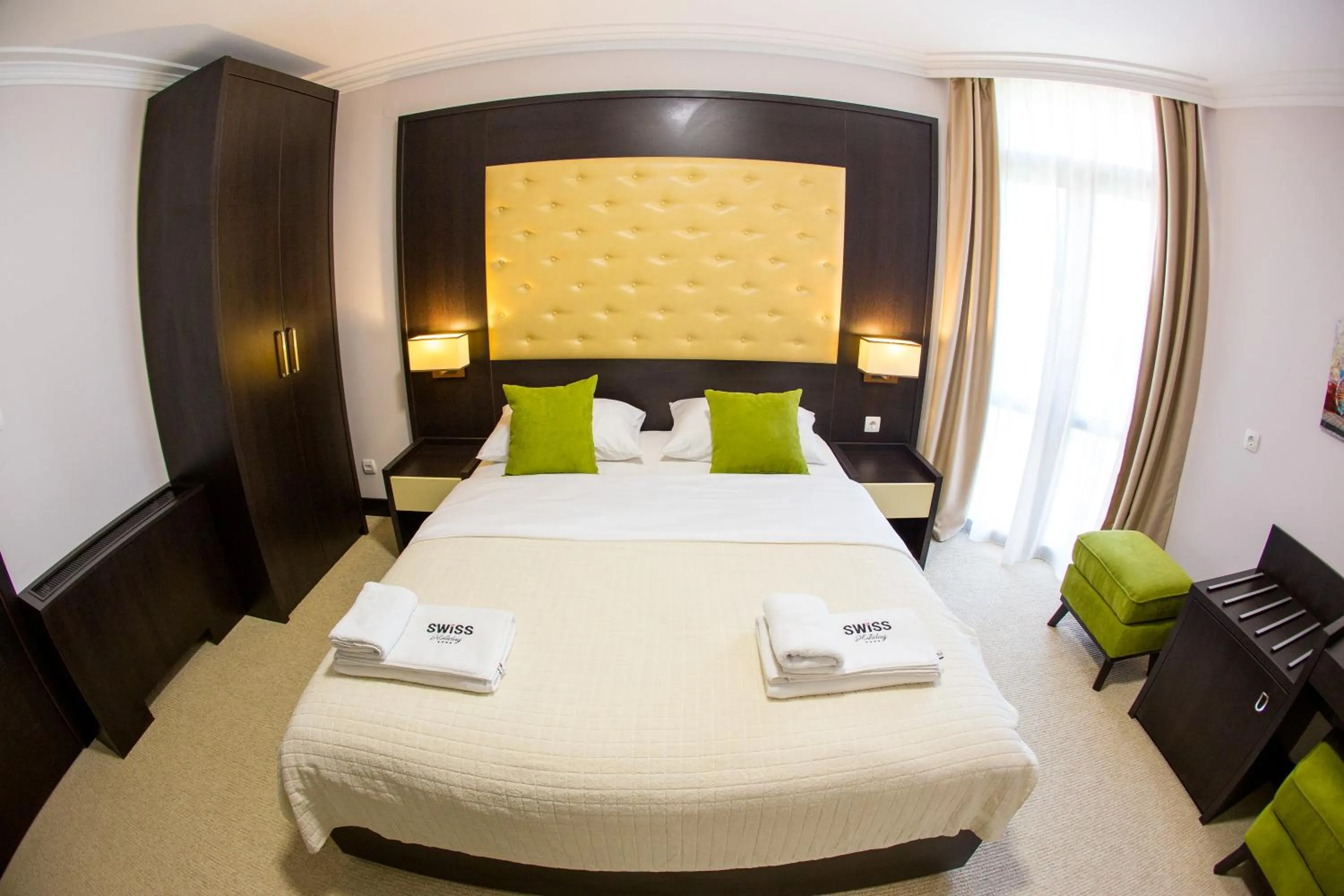 Photo of the whole room in Swiss Holiday