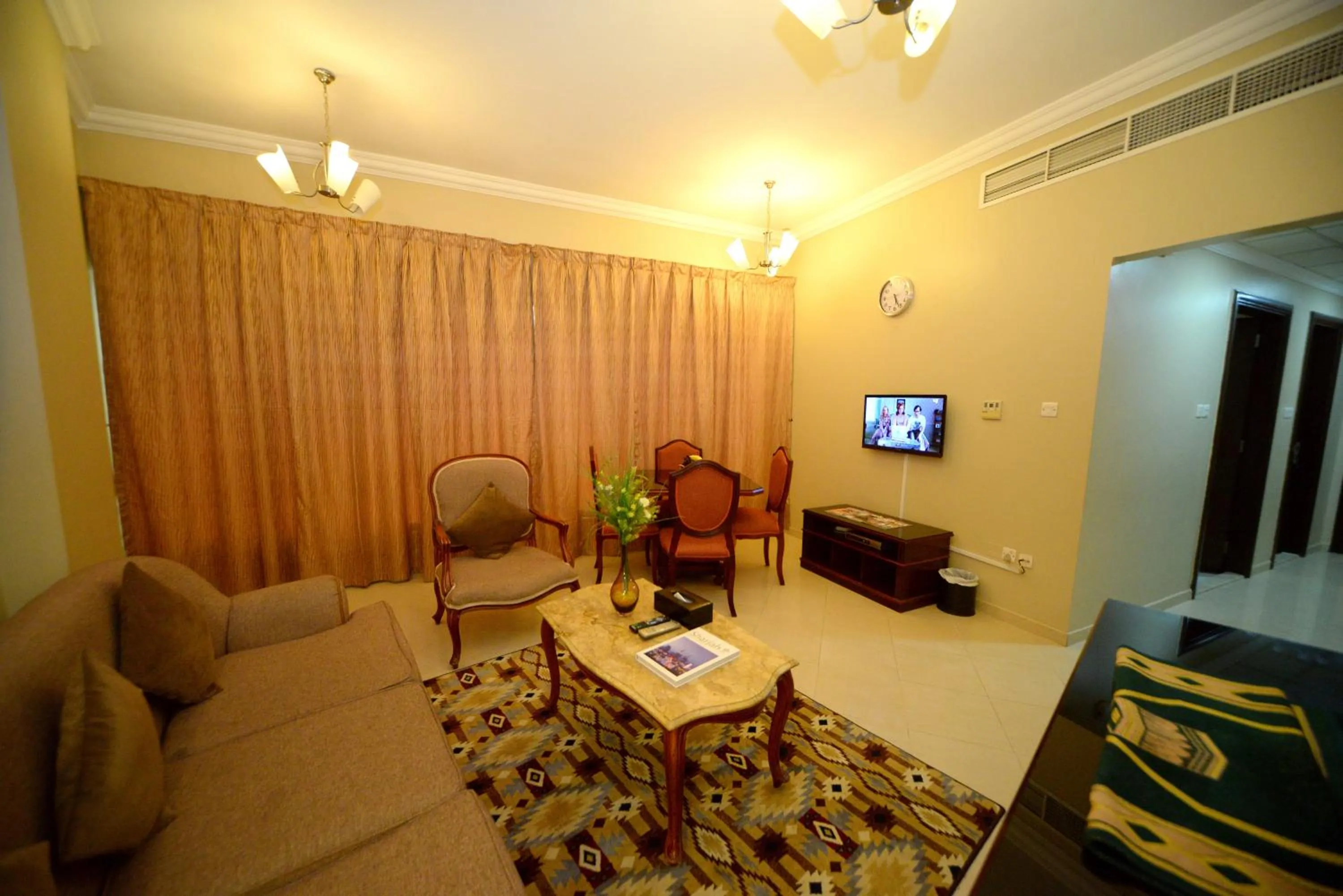 Living room in Emirates Stars Hotel Apartments Sharjah