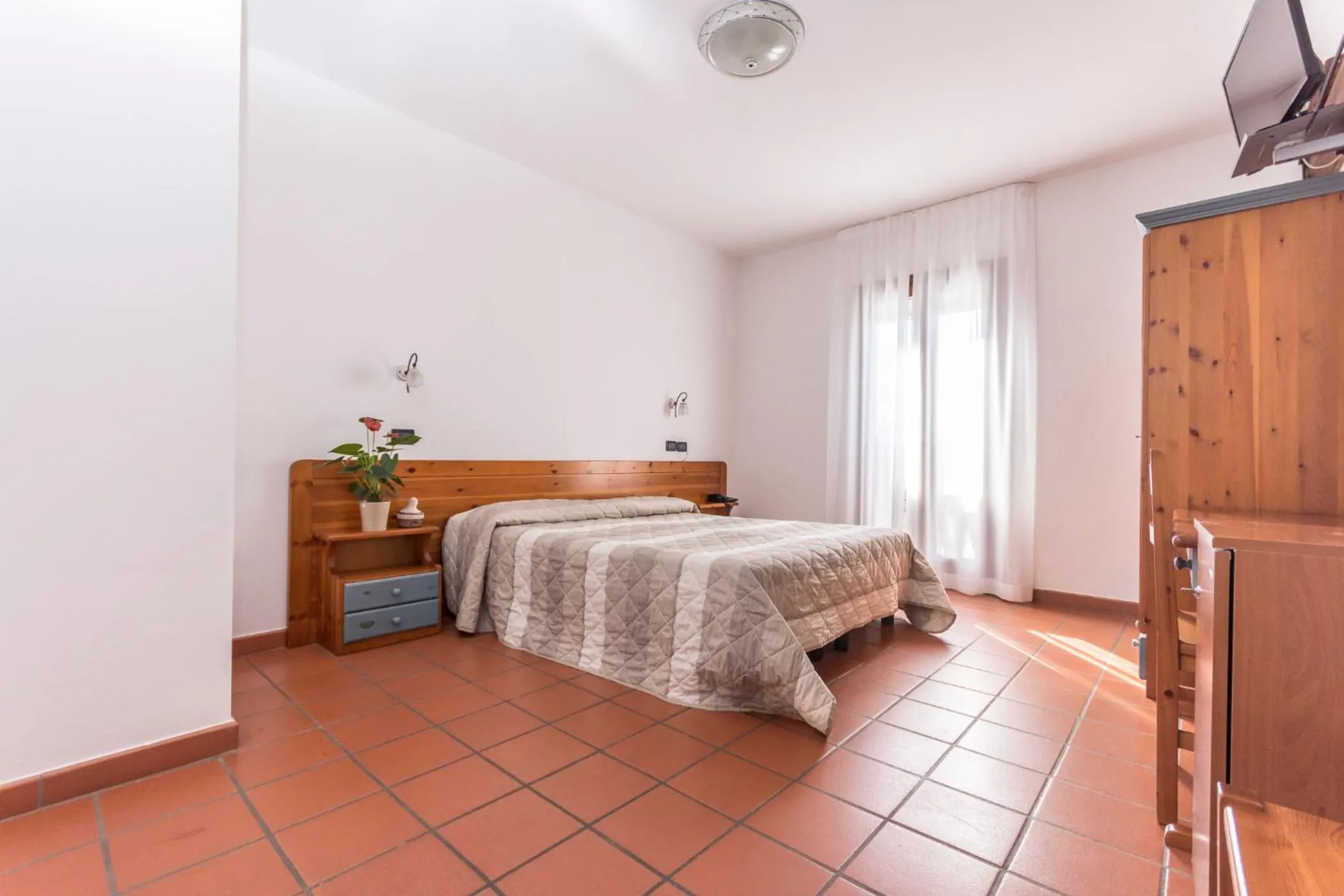 Bed in Hotel Residence - Il Giardino del Cigno