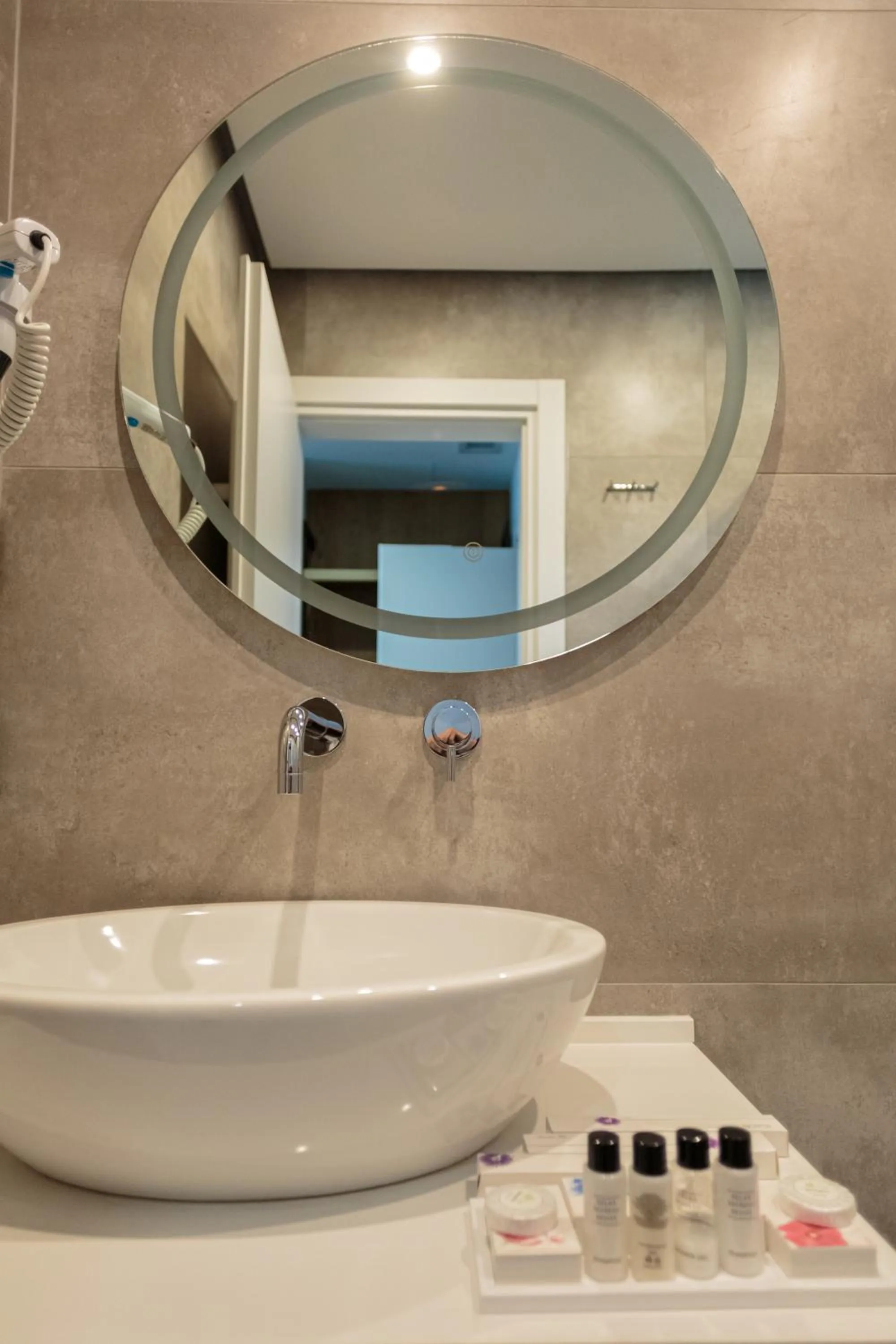 Bathroom in Ames Hotel & SPA