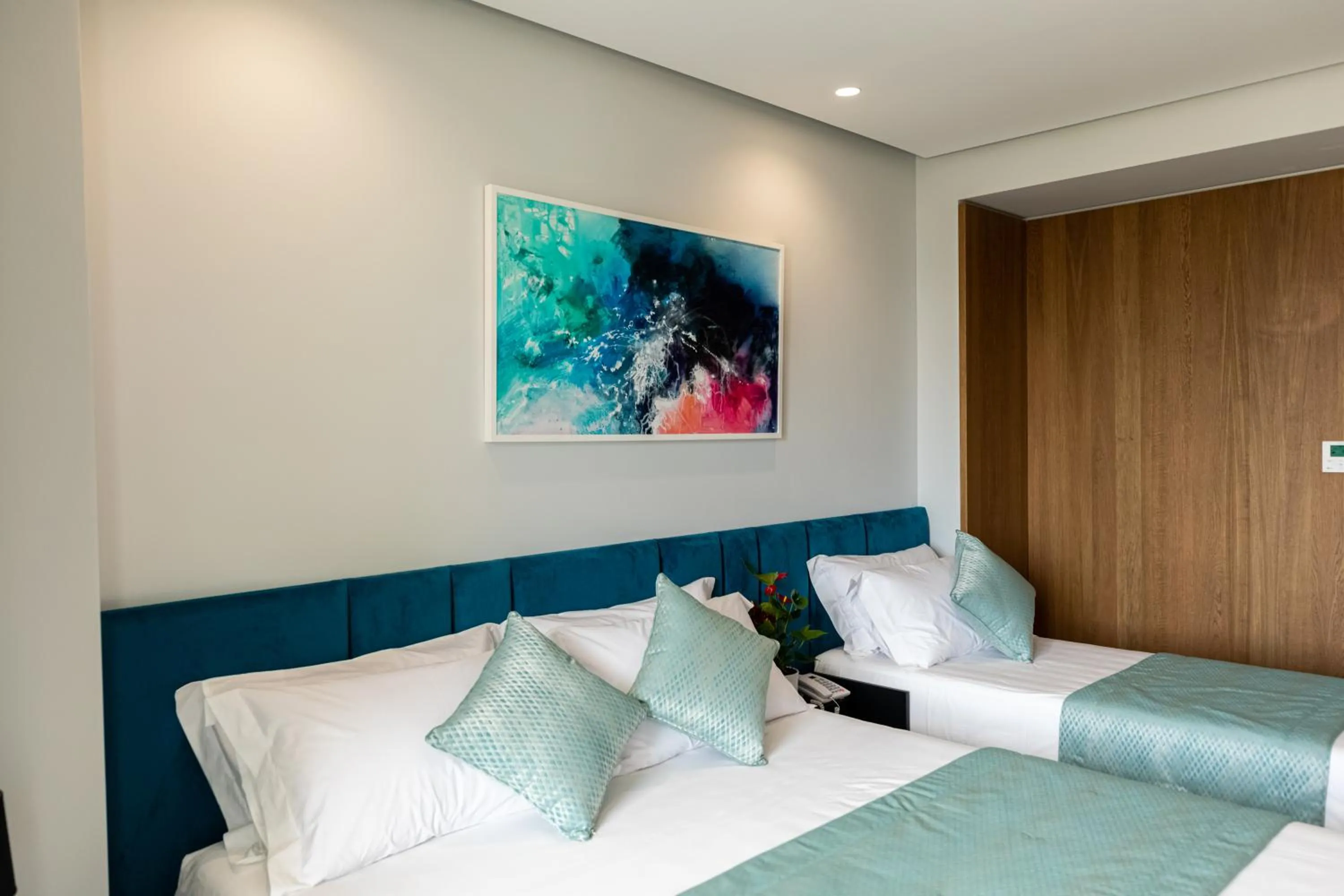 Bed in Ames Hotel & SPA