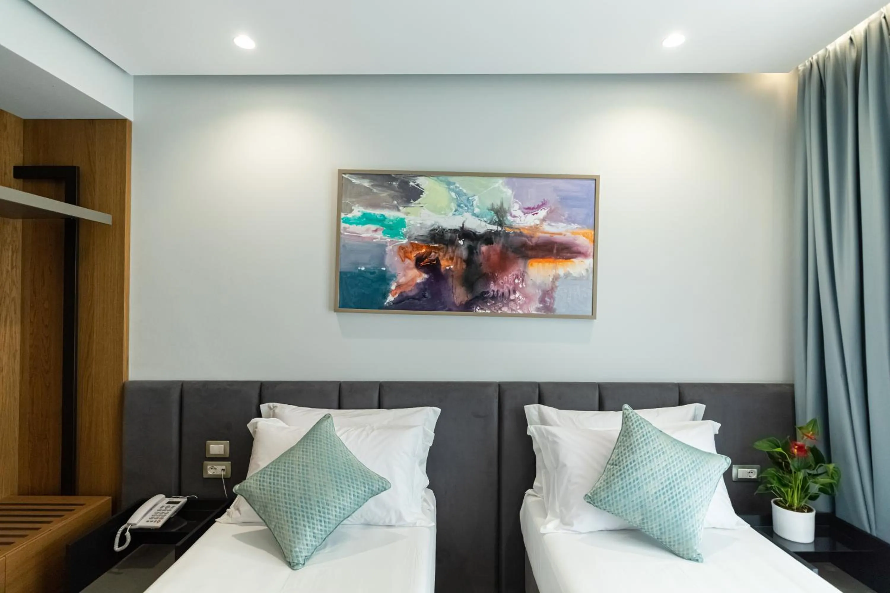 Bed in Ames Hotel & SPA