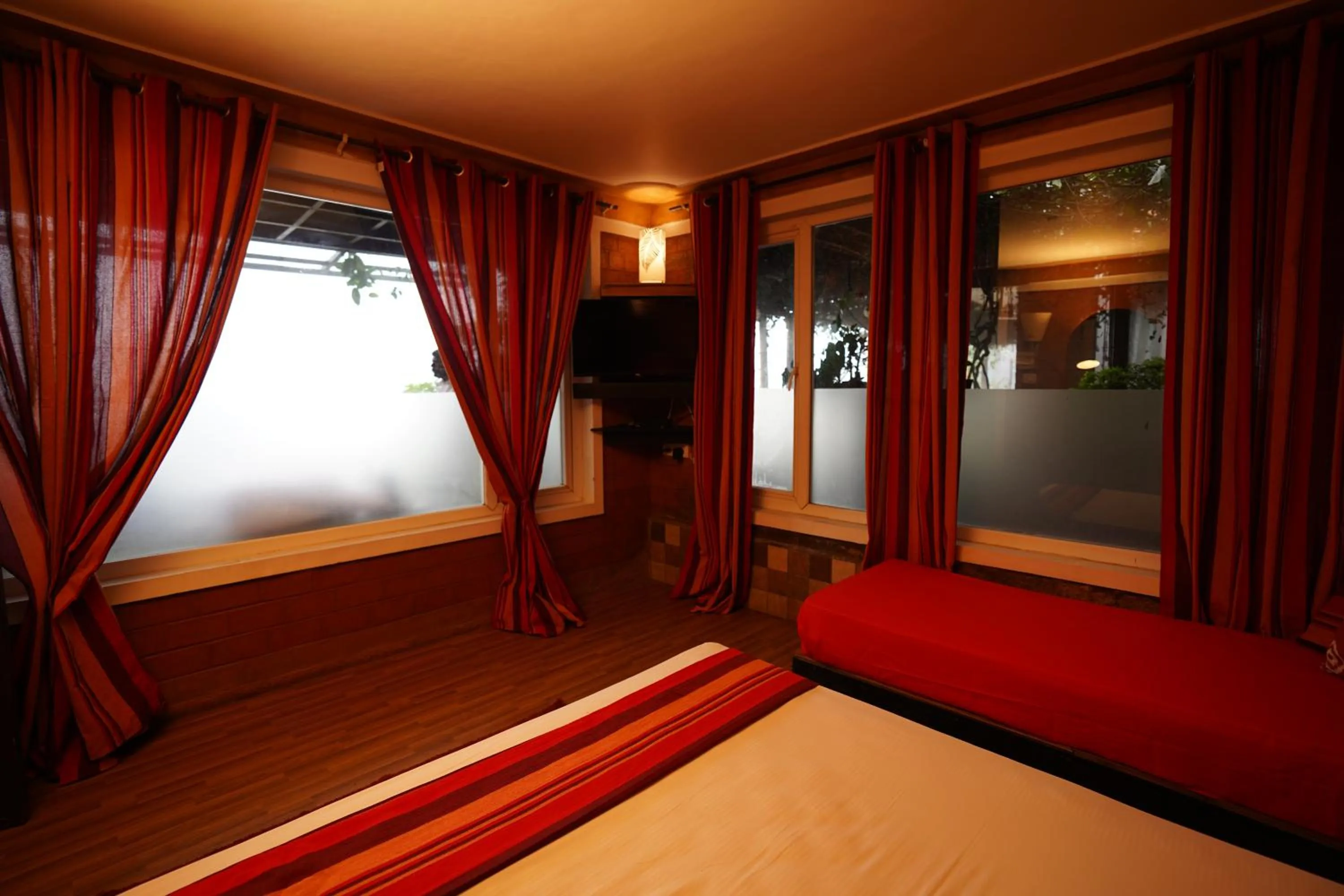 Bed in De Rock Jungle Living Resort