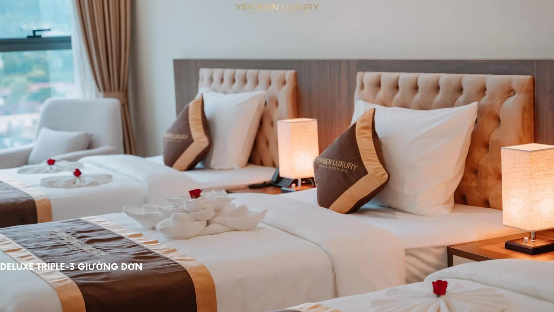 Bed in YEN BIEN LUXURY HOTEL