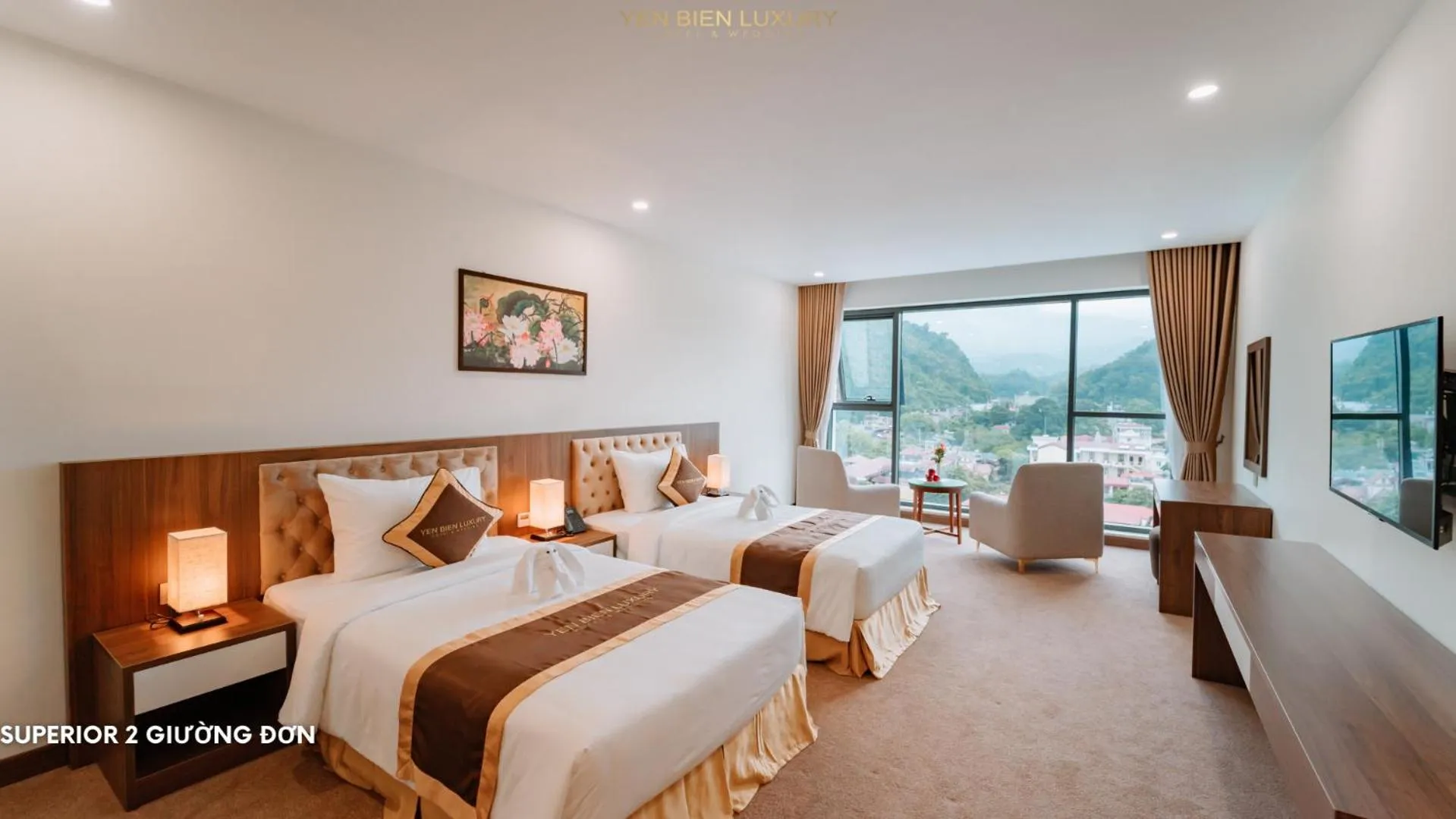 Bed in YEN BIEN LUXURY HOTEL